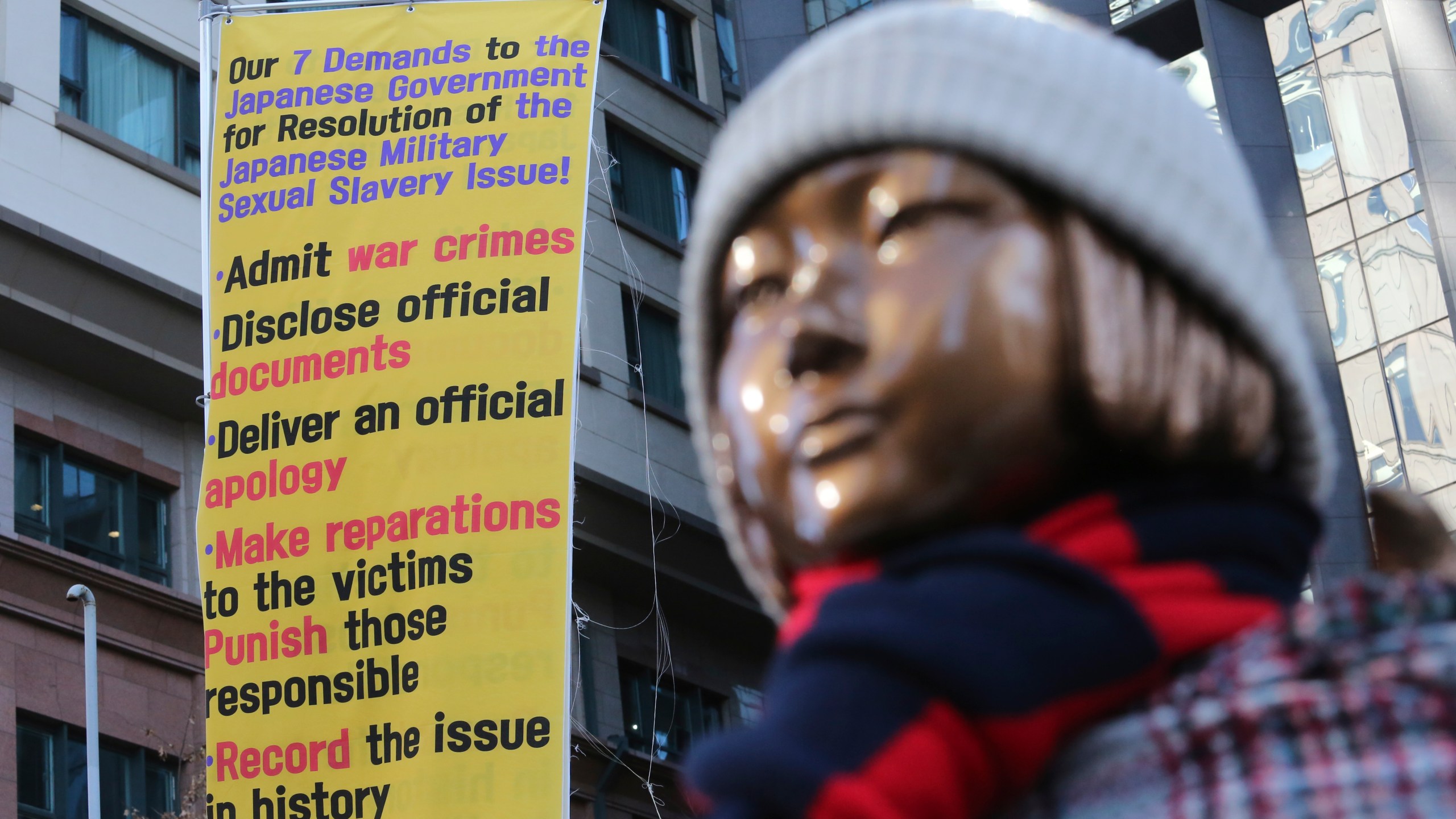 FILE - A statue symbolizing a wartime sex slave is displayed near the Japanese Embassy in Seoul, South Korea, on Jan. 8, 2021. (AP Photo/Ahn Young-joon, File)