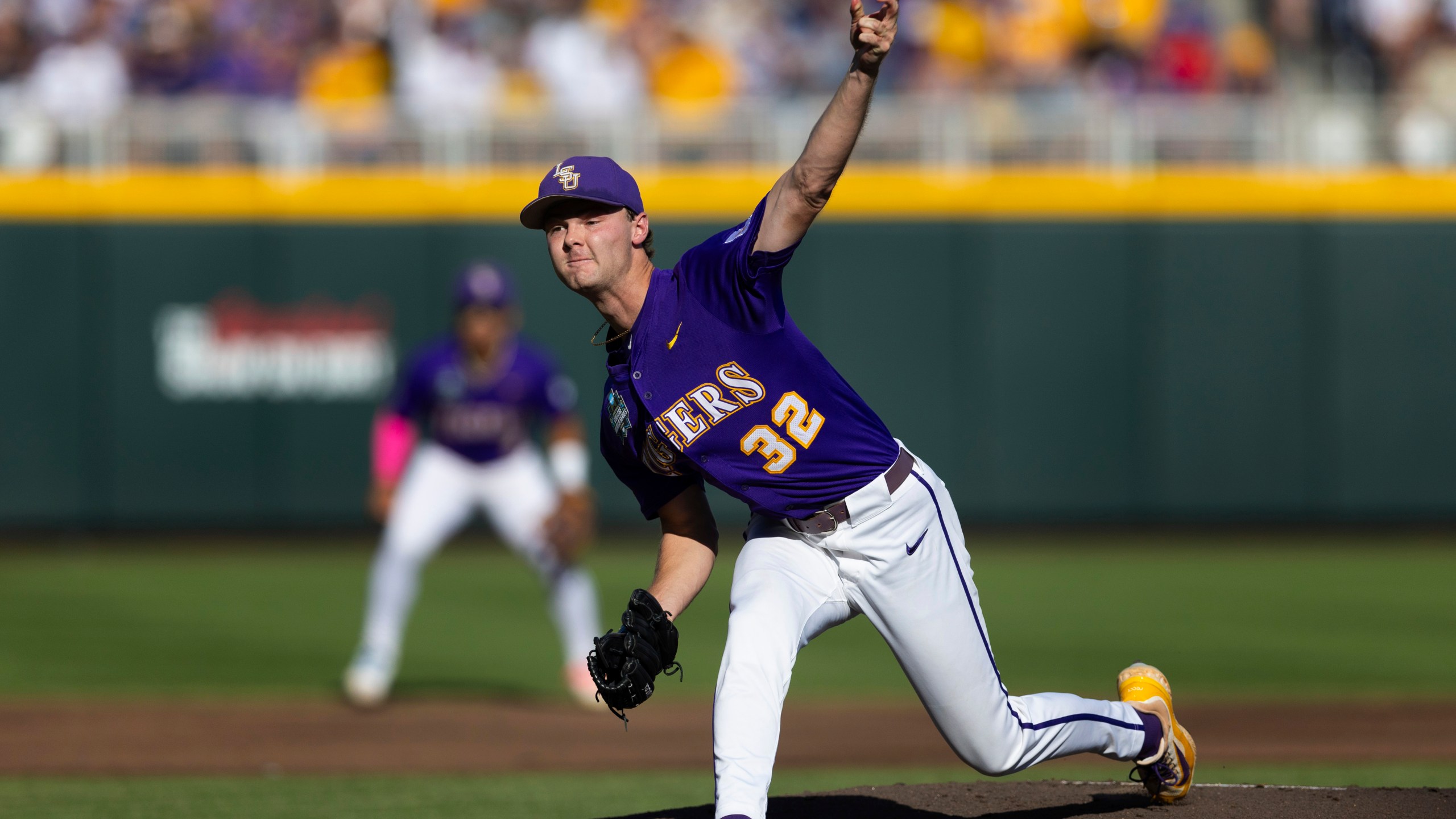 LSU starting pitcher Kade Anderson (32) throws against Coastal Carolina in the first inning of Game 1 of the NCAA College World Series baseball finals in Omaha, Neb., Saturday, June 21, 2025. (AP Photo/Rebecca S. Gratz)