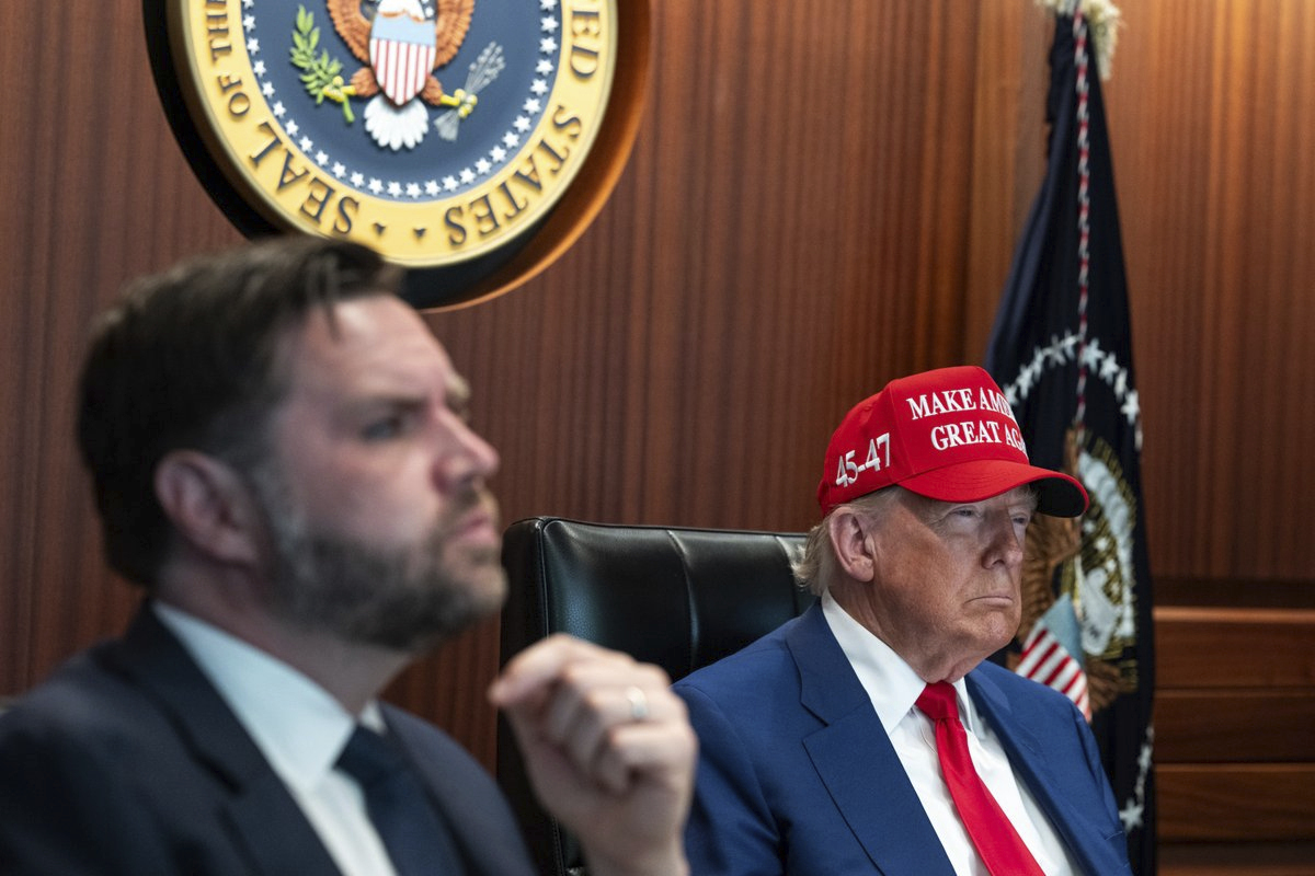 In this image provided by the White House, President Donald Trump, right, and Vice President JD Vance sit in the Situation Room, Saturday, June 21, 2025, at the White House in Washington. (The White House via AP)