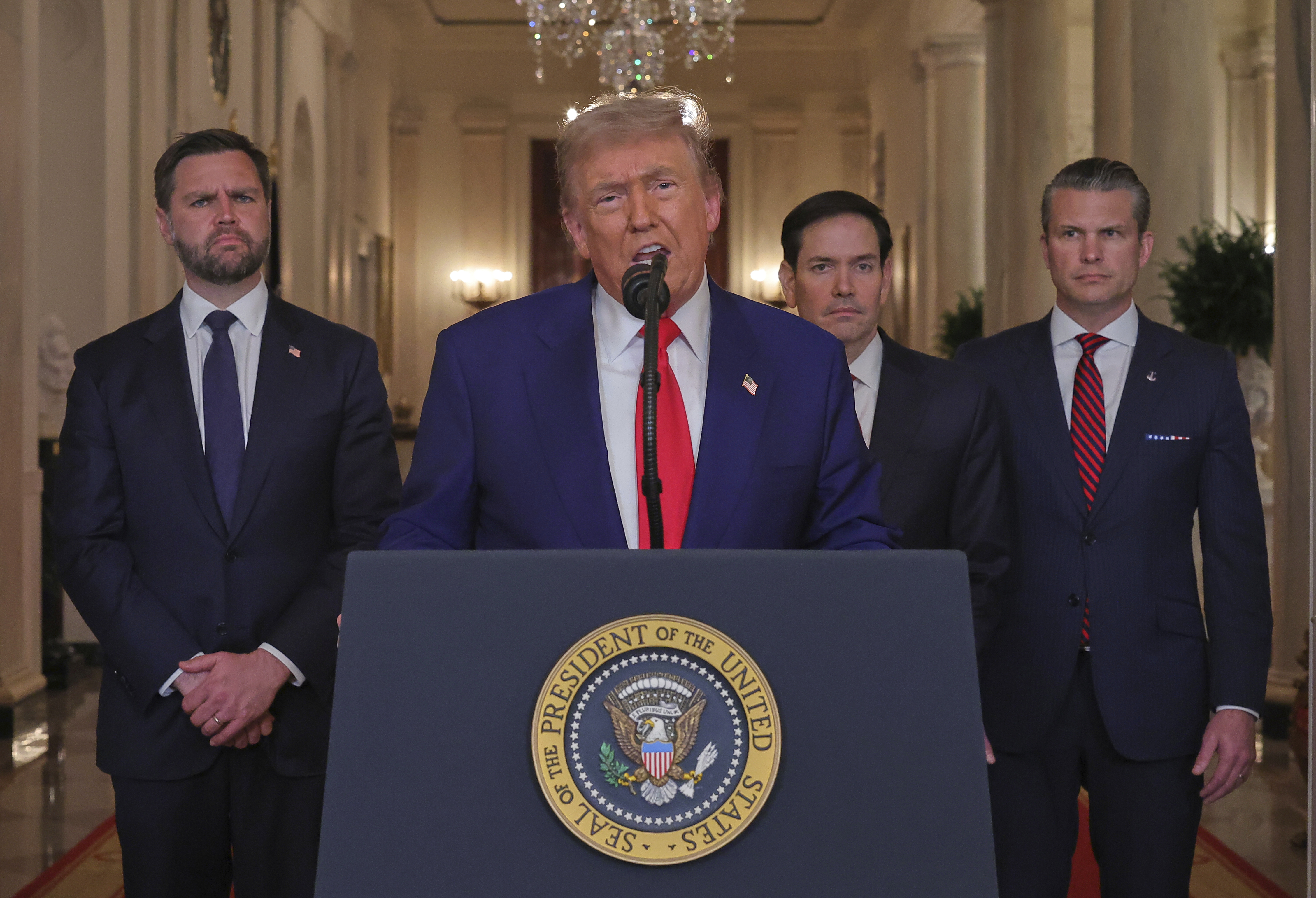 President Donald Trump speaks from the East Room of the White House in Washington, Saturday, June 21, 2025, after the U.S. military struck three Iranian nuclear and military sites, directly joining Israel's effort to decapitate the country's nuclear program, as Vice President JD Vance, Secretary of State Marco Rubio and Defense Secretary Pete Hegseth listen. (Carlos Barria/Pool via AP)
