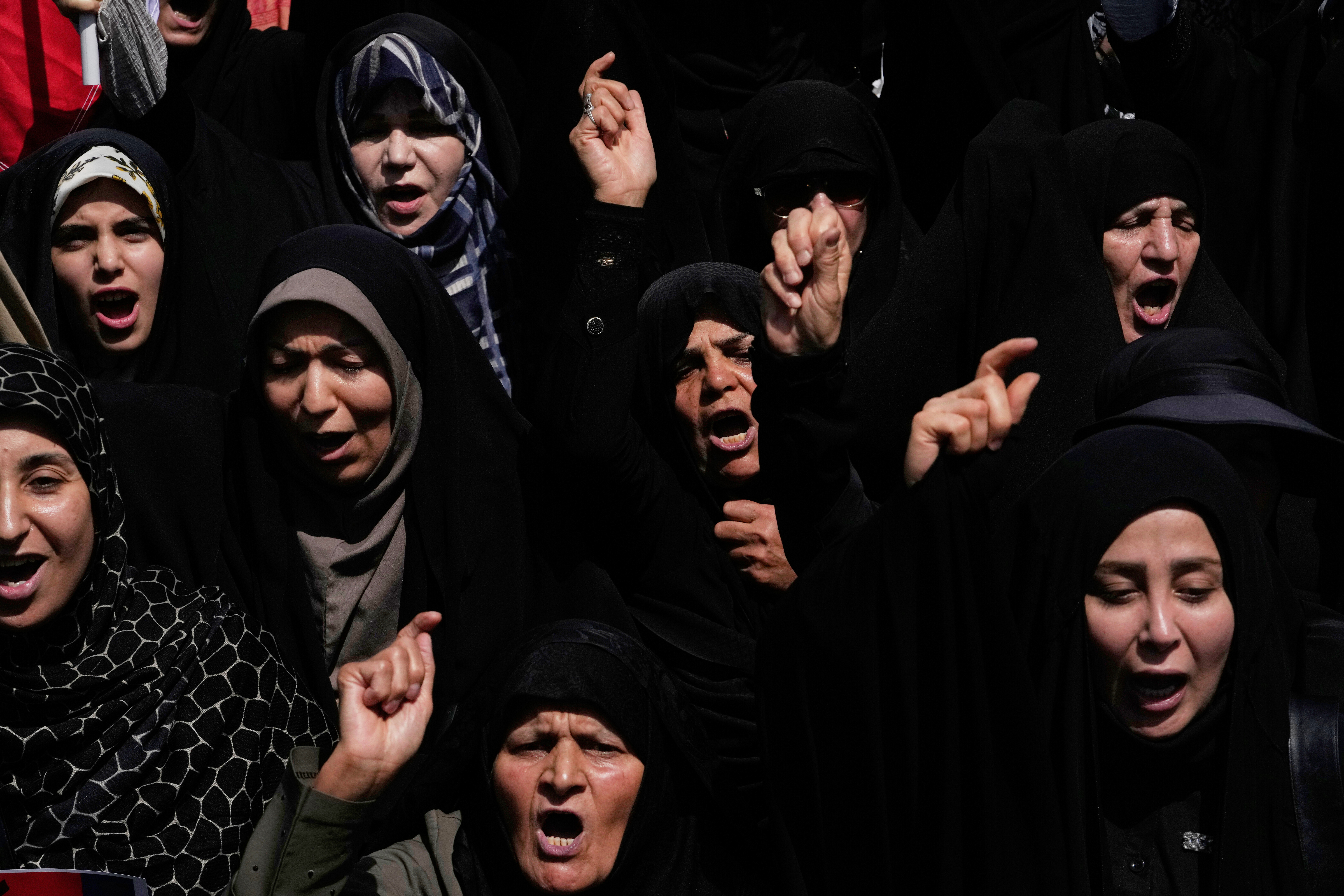 Women chant slogans during a protest to condemn Israeli attacks on multiple cities across Iran, after attending a Friday prayers ceremony in Tehran, Iran, Friday, June 20, 2025. (AP Photo/Vahid Salemi)