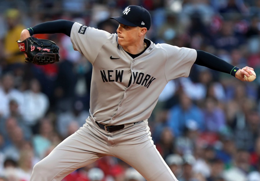 New York Yankees pitcher Ryan Yarbrough winds up during a baseball game against the Boston Red Sox, Friday, June 13, 2025, in Boston. (AP Photo/Jim Davis)