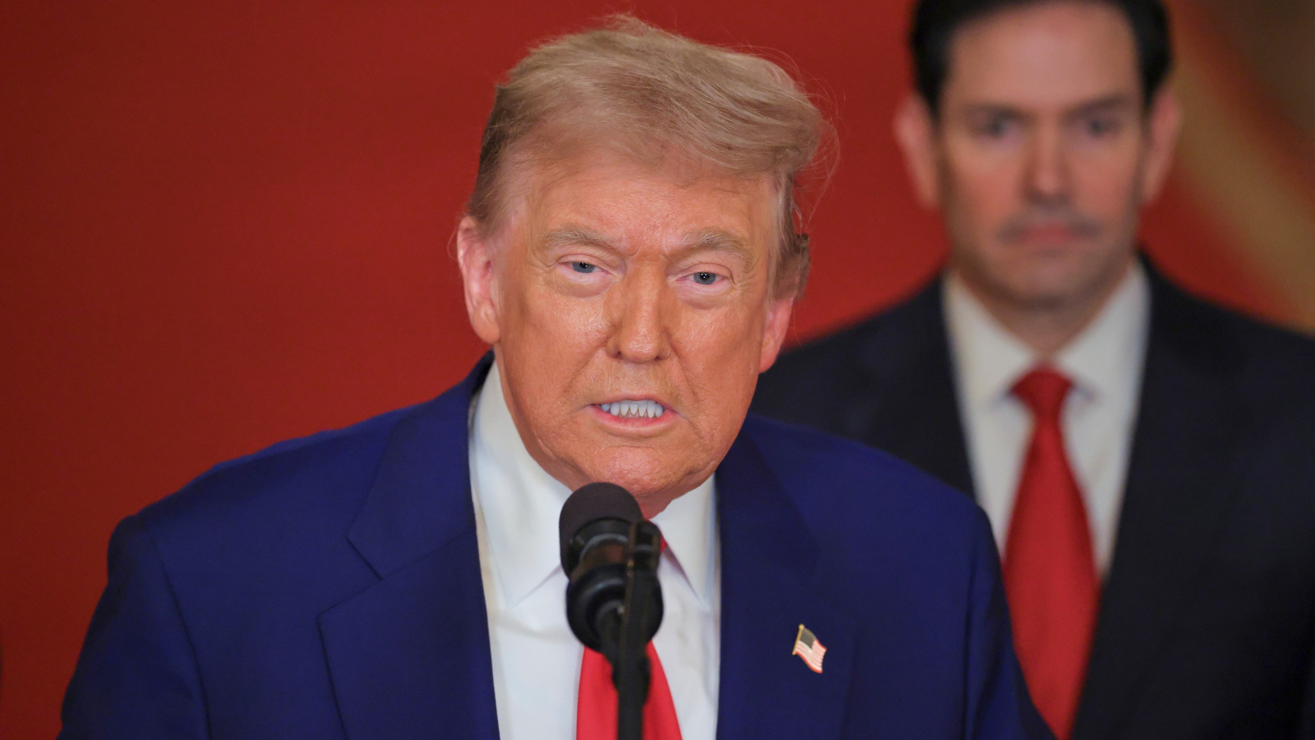 President Donald Trump speaks from the East Room of the White House in Washington, Saturday, June 21, 2025, after the U.S. military struck three Iranian nuclear and military sites, directly joining Israel's effort to decapitate the country's nuclear program, as Secretary of State Marco Rubio listens. (Carlos Barria/Pool via AP)