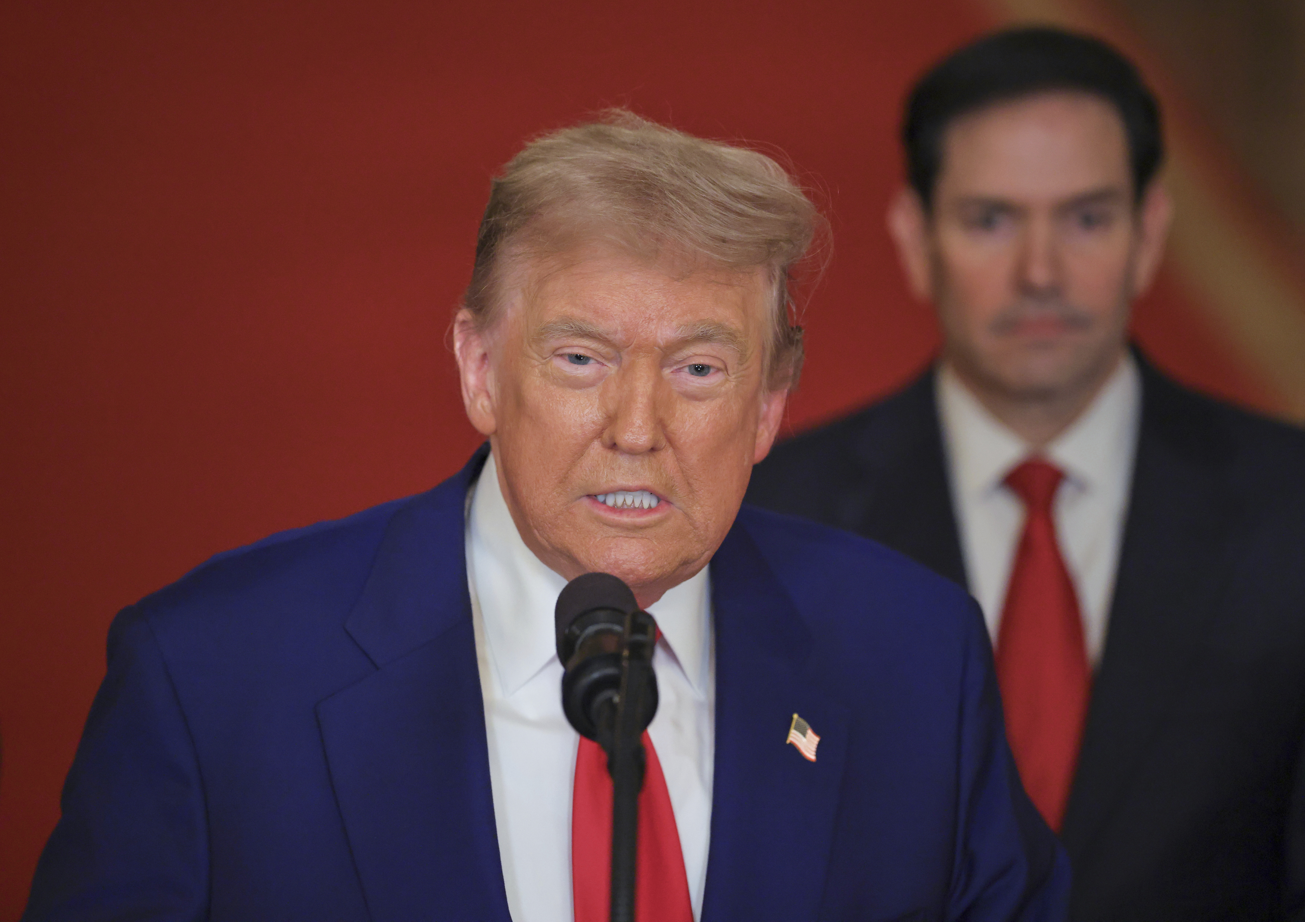 President Donald Trump speaks from the East Room of the White House in Washington, Saturday, June 21, 2025, after the U.S. military struck three Iranian nuclear and military sites, directly joining Israel's effort to decapitate the country's nuclear program, as Secretary of State Marco Rubio listens. (Carlos Barria/Pool via AP)