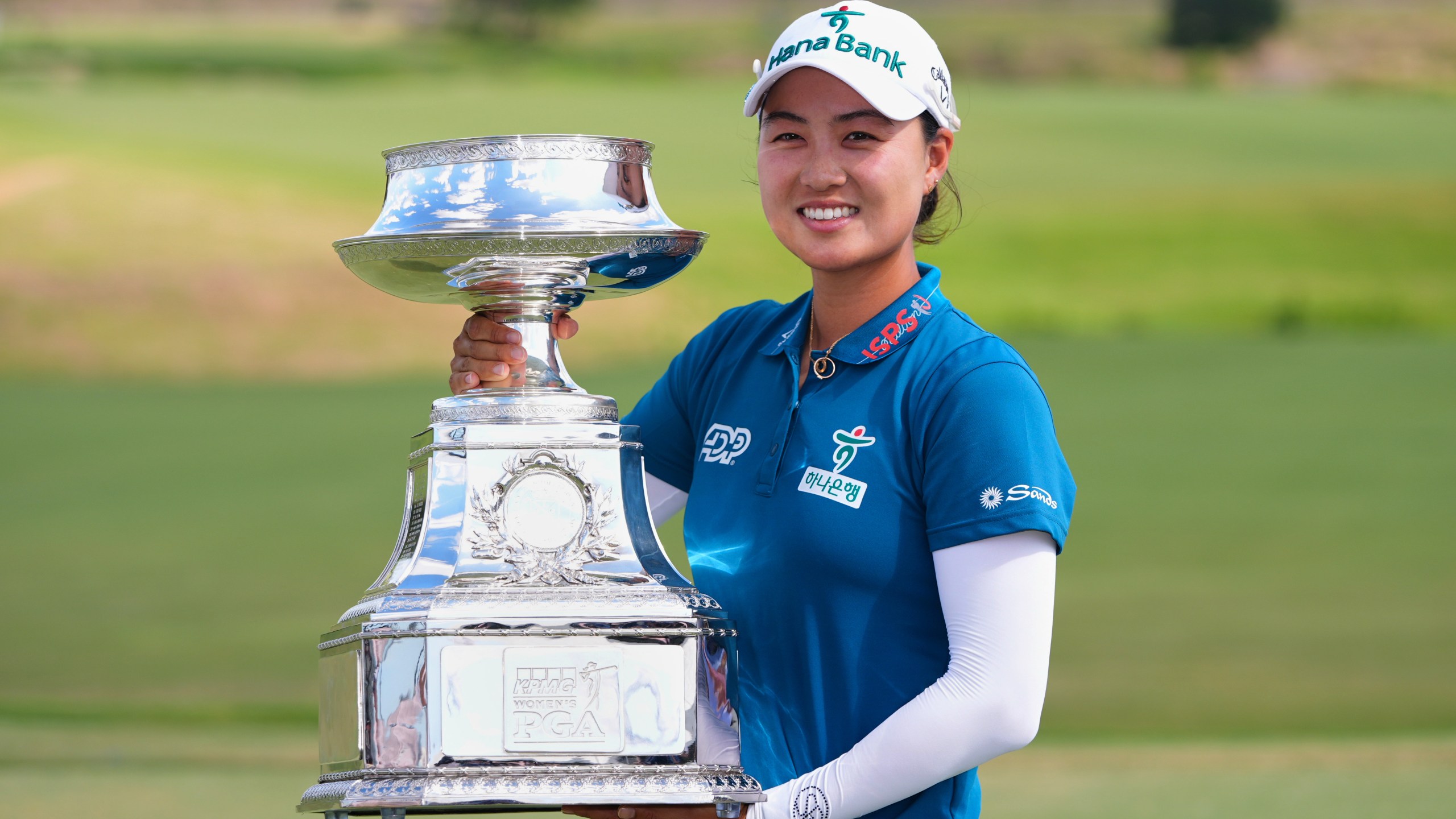 Minjee Lee holds the trophy after winning the Women's PGA Championship golf tournament Sunday, June 22, 2025, in Frisco, Texas. (AP Photo/LM Otero)