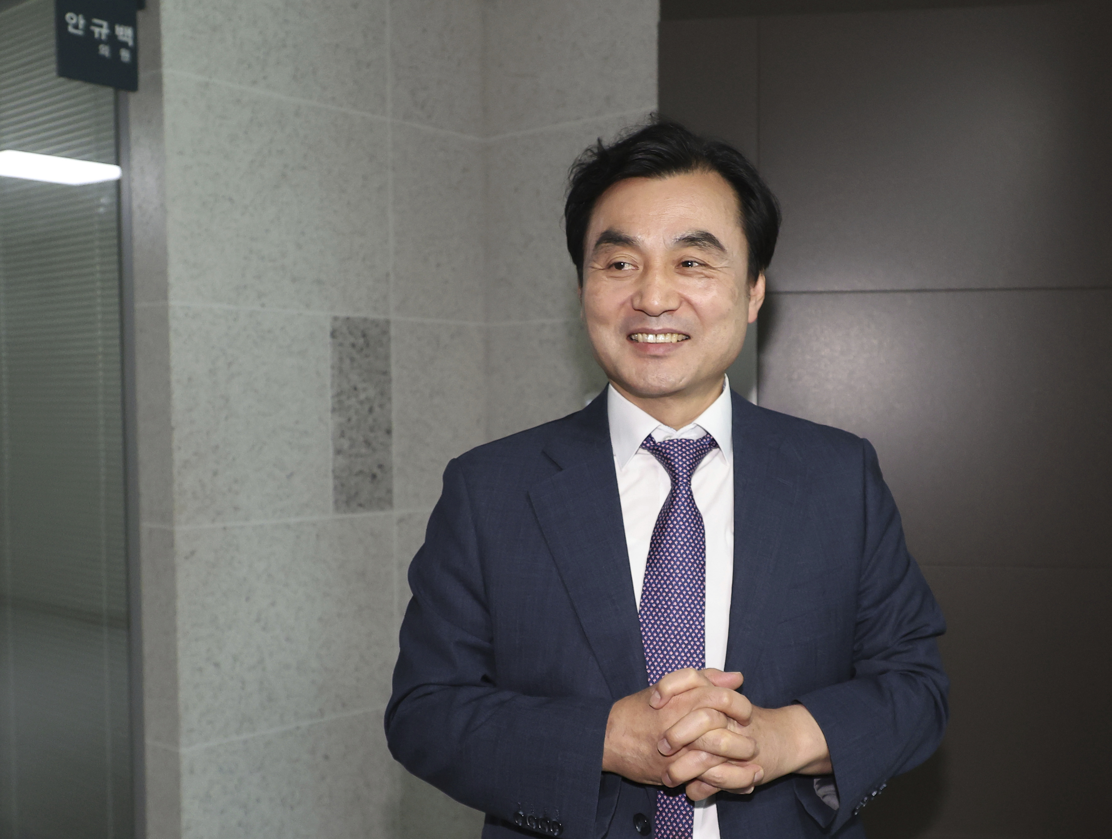 Ahn Gyu-back, South Korean defense minister nominee, leaves his office at the National Assembly in Seoul, South Korea, Monday, June 23, 2025. (Park Dong-joo/Yonhap via AP)