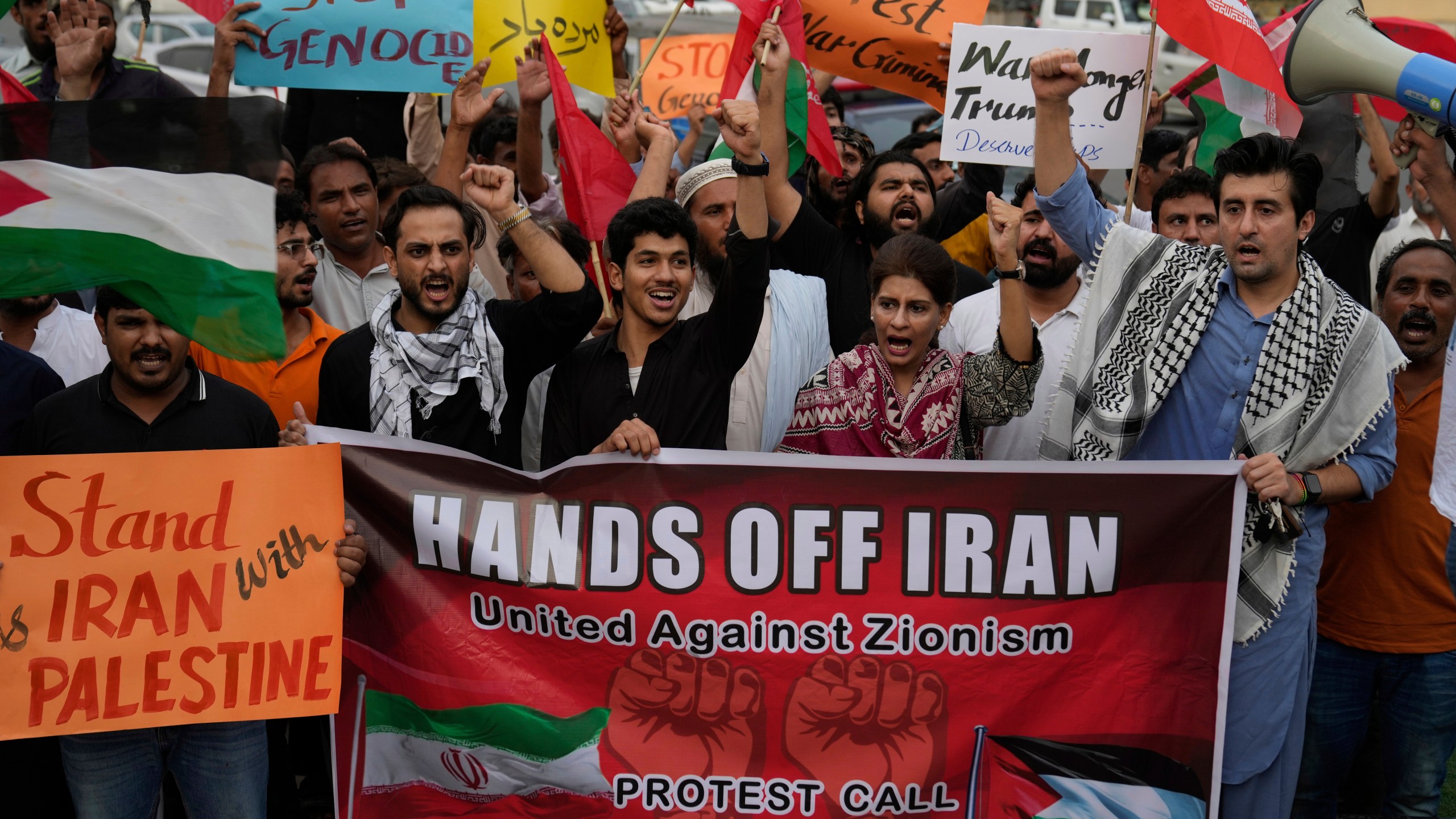 Members of a civil society group hold a demonstration to condemn Israeli strikes on Iran in Lahore, Pakistan, Sunday, June 22, 2025. (AP Photo/K.M. Chaudary)