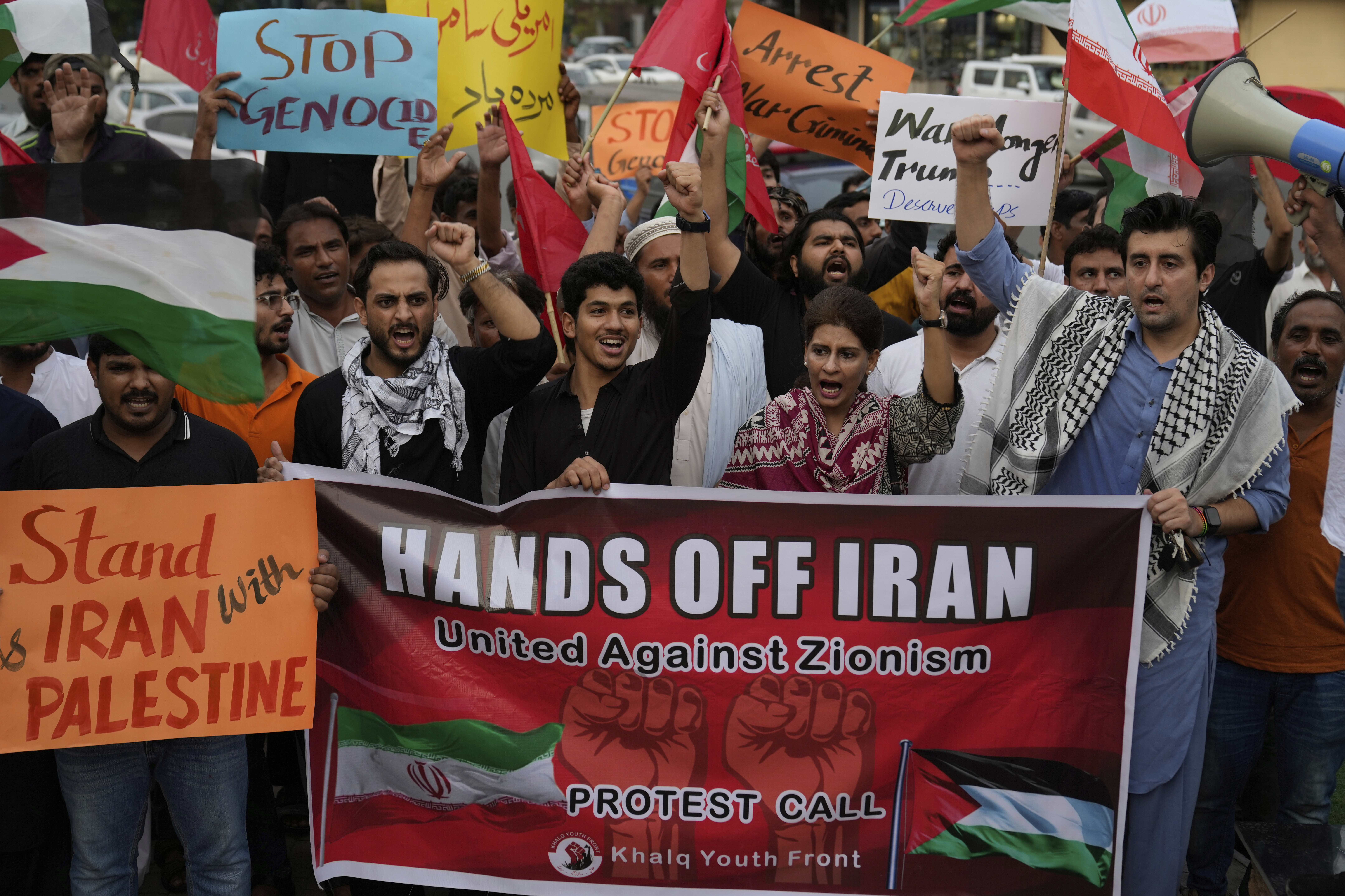 Members of a civil society group hold a demonstration to condemn Israeli strikes on Iran in Lahore, Pakistan, Sunday, June 22, 2025. (AP Photo/K.M. Chaudary)