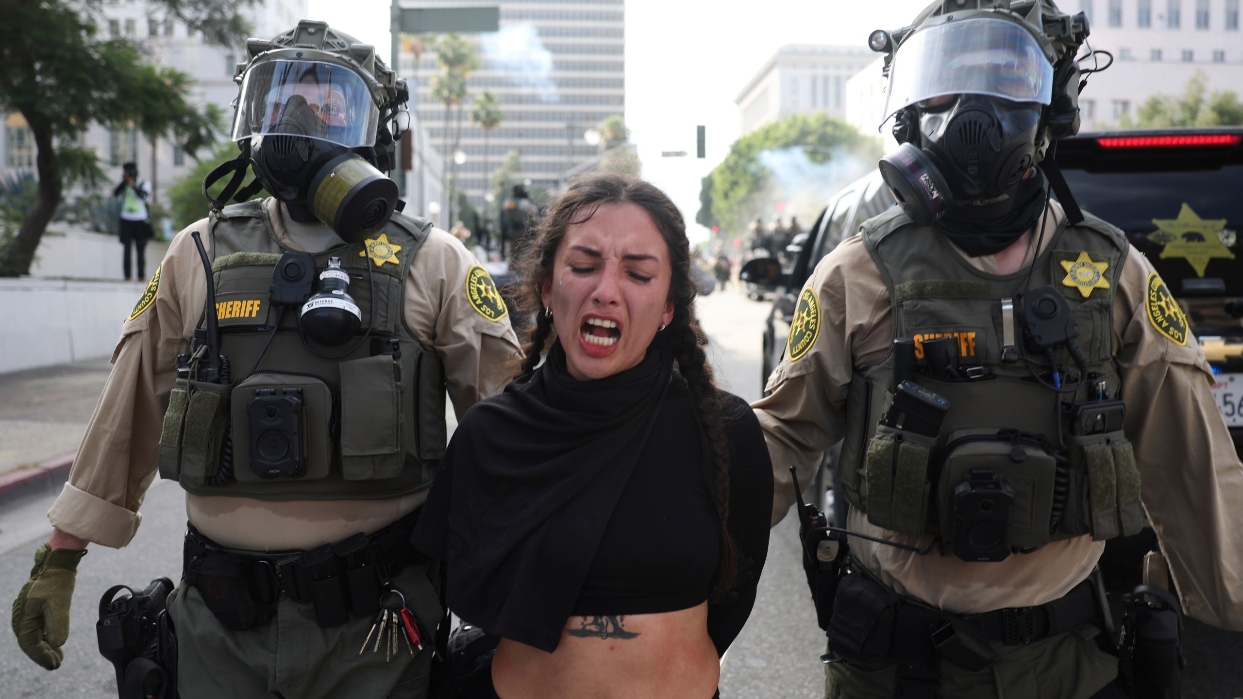 Los Angeles County Sheriffs arrest a demonstrator during a protest Saturday, June 14, 2025, in Los Angeles. (AP Photo/Ethan Swope)