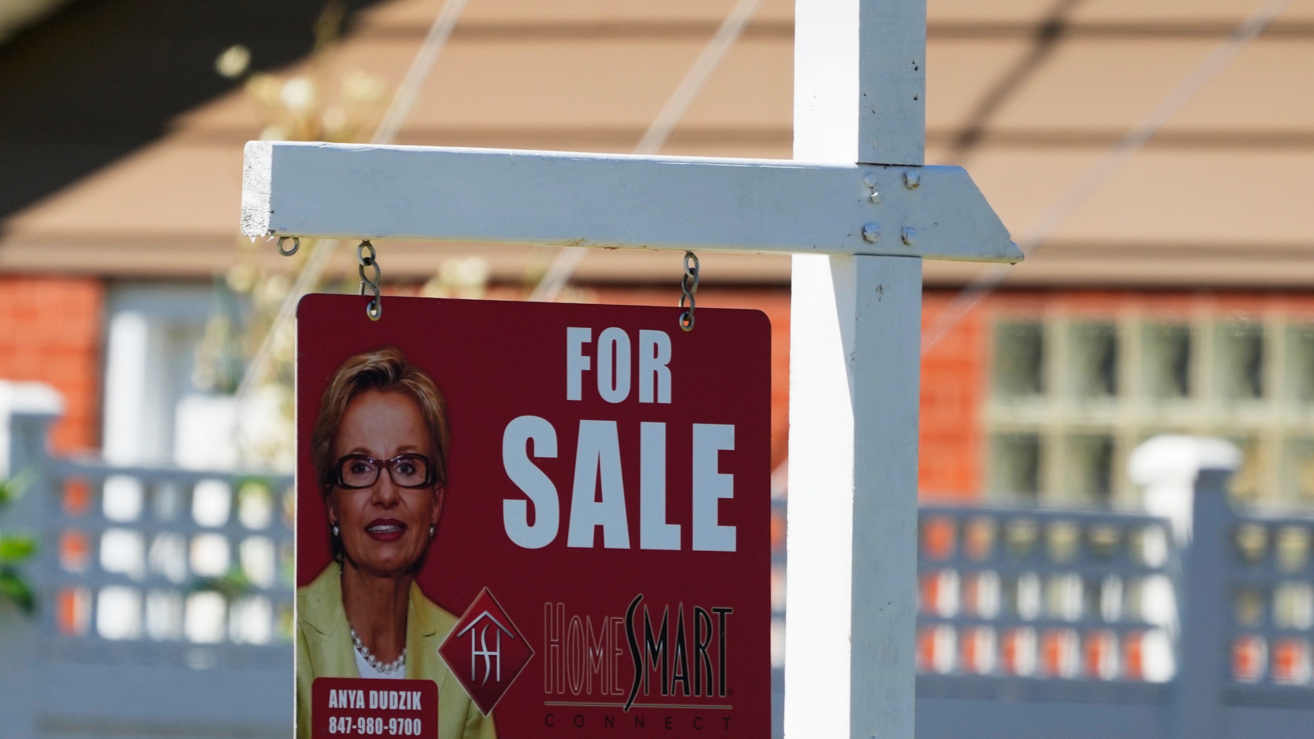 FILE - A for sale sign stands outside a residence in Niles, Ill., Monday, July 1, 2024. (AP Photo/Nam Y. Huh, File)