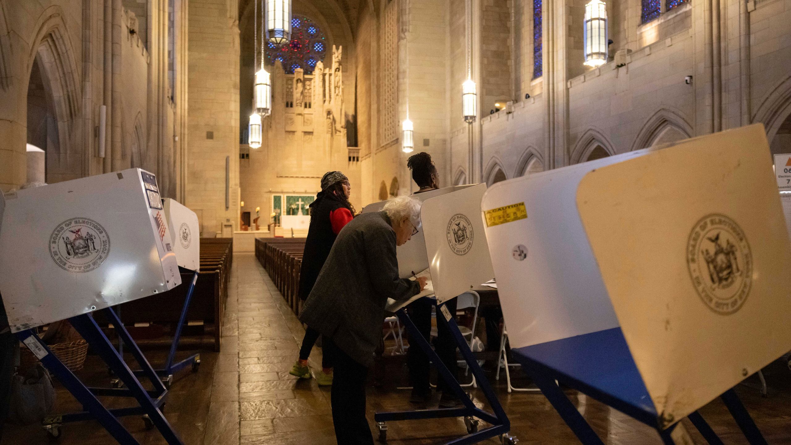 FILE - A voter casts a ballot at the Church of the Heavenly Rest in New York on Election Day, Tuesday, Nov. 5, 2024. (AP Photo/Yuki Iwamura, File)