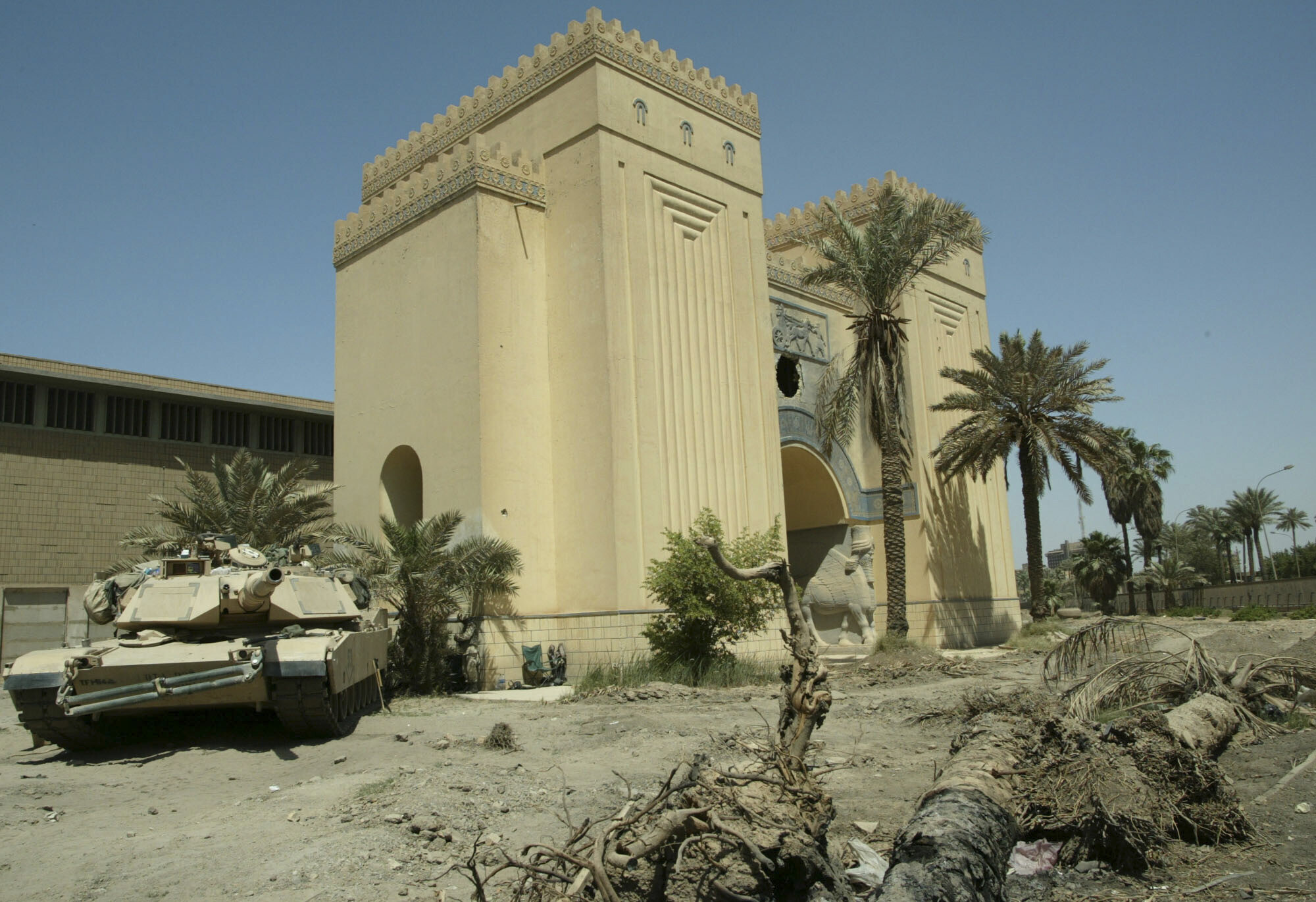 FILE - A U.S. Army tank is parked outside the Iraqi National Museum in Baghdad on May 6, 2003. (AP Photo/Murad Sezer, File)