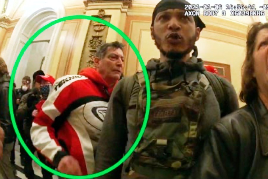 This image from the Department of Justice statement of facts to support an arrest warrant for David Walls-Kaufman, shows an image from police body-worn video, contained and annotated by the source, of David Walls-Kaufman in the U.S. Capitol Jan. 6, 2021, in Washington. (Department of Justice via AP)