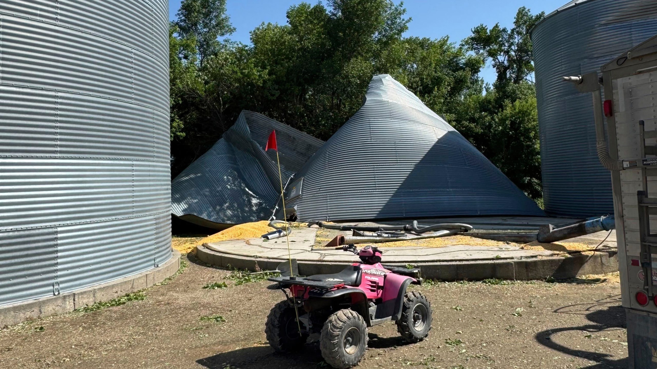 This photo taken Saturday, June 21, 2025, by Kylie Weber shows the grain bin lost in a storm at her family's farm near Oriska, N.D. (Kylie Weber via AP)