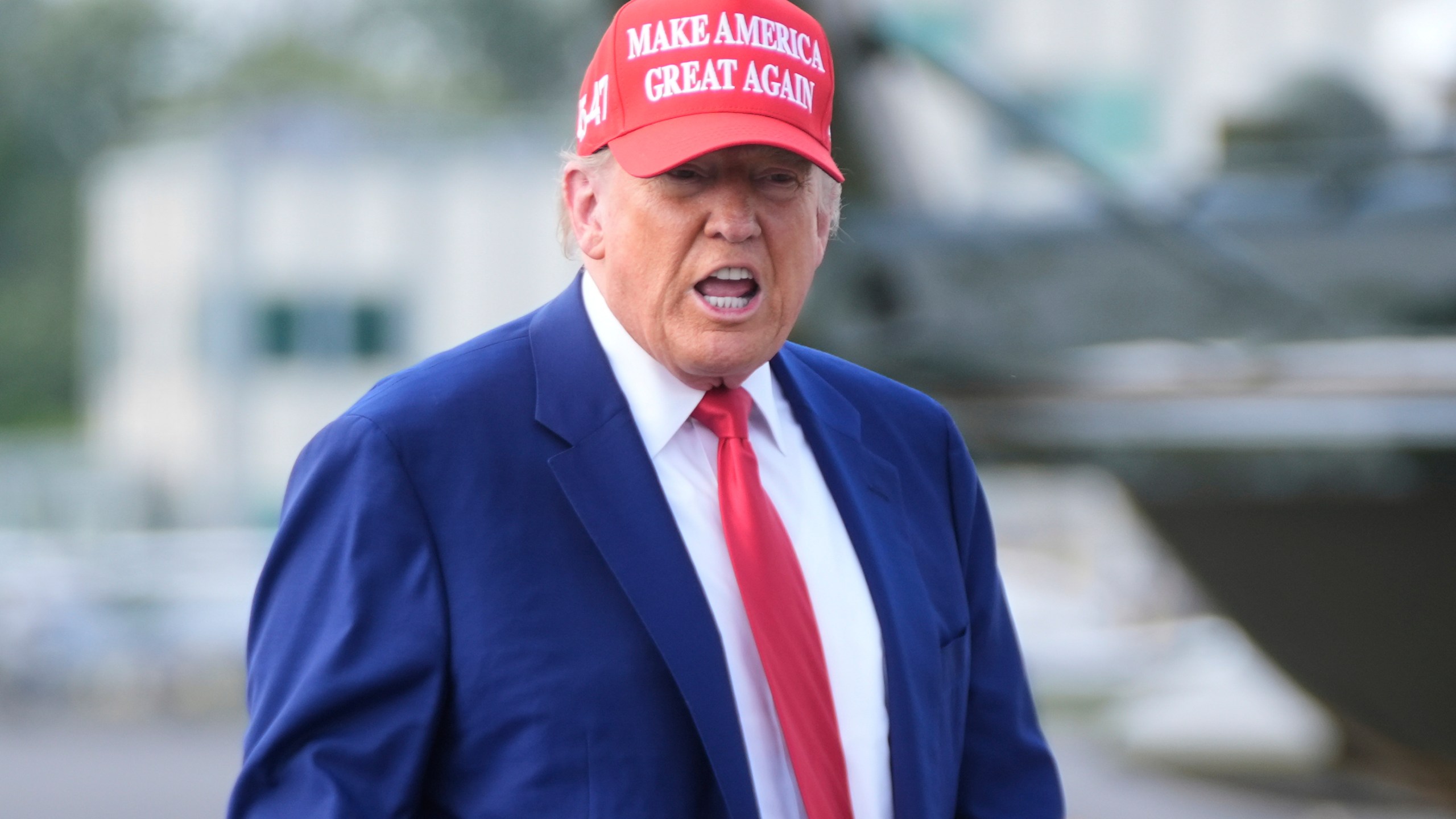 President Donald Trump boards Air Force One at Morristown Municipal Airport in Morristown, N.J., Saturday, June 21, 2025. (AP Photo/Manuel Balce Ceneta)