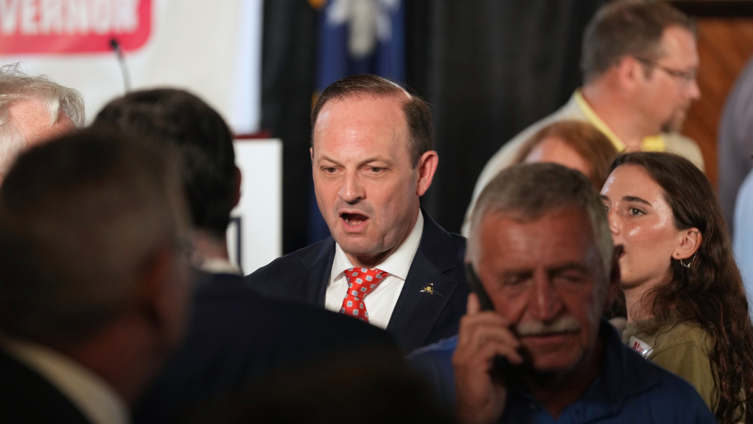 South Carolina Attorney General Alan Wilson, center, mingles with supporters at his launch event for the state's 2026 governor's race Monday, June 23, 2025, in Lexington, S.C. (AP Photo/Meg Kinnard)
