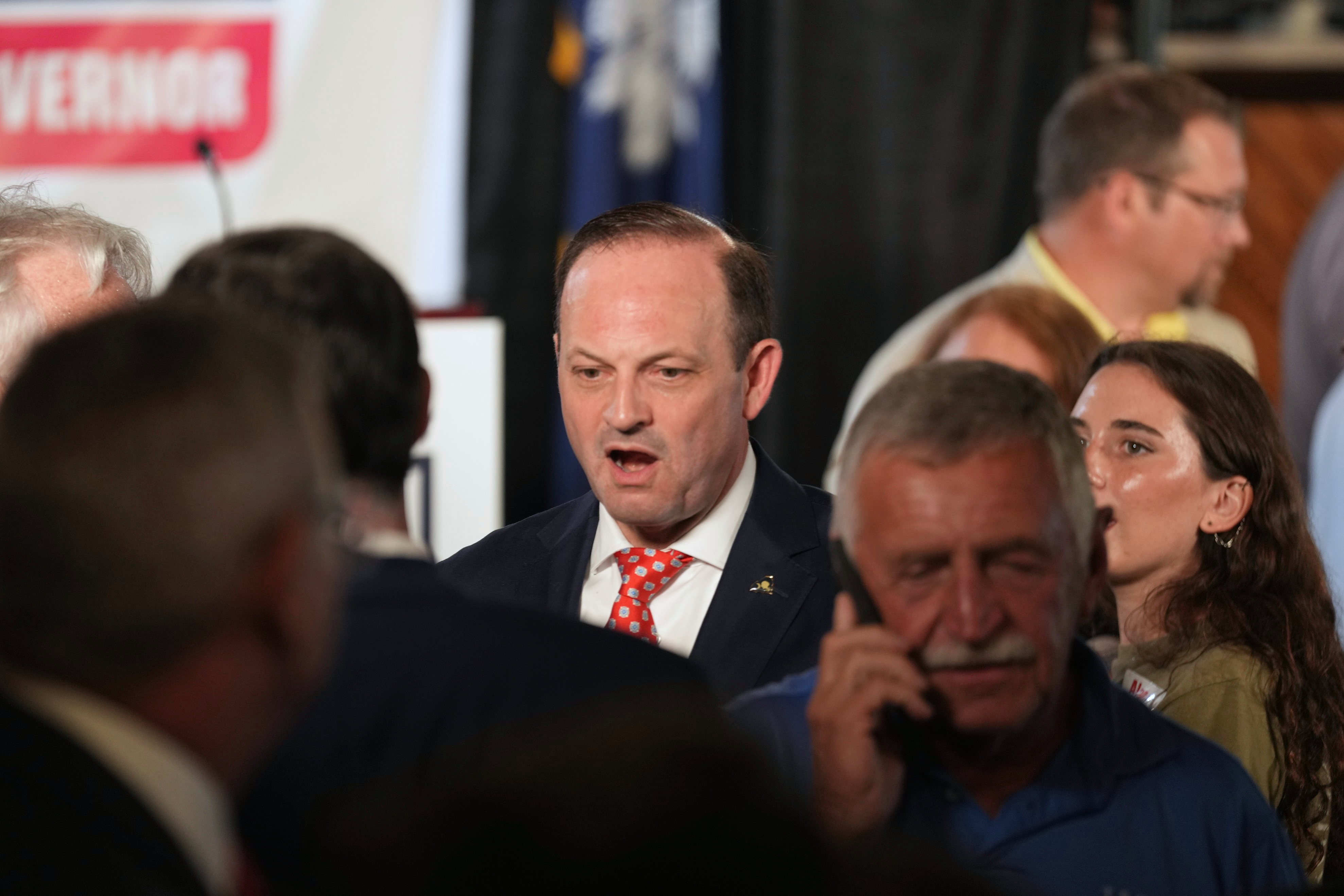 South Carolina Attorney General Alan Wilson, center, mingles with supporters at his launch event for the state's 2026 governor's race Monday, June 23, 2025, in Lexington, S.C. (AP Photo/Meg Kinnard)