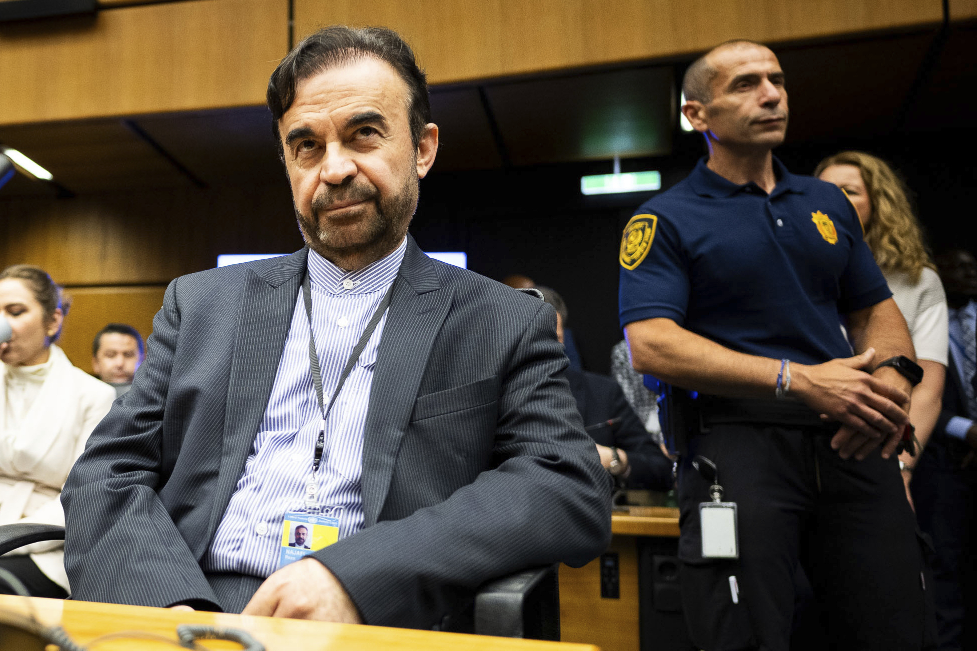 Iran's Ambassador to the International Atomic Energy Agency, IAEA, Reza Najafi, left, attends an IAEA Board of Governors meeting in Vienna, Austria, Monday, June 23, 2025. (AP Photo/Michael Gruber)