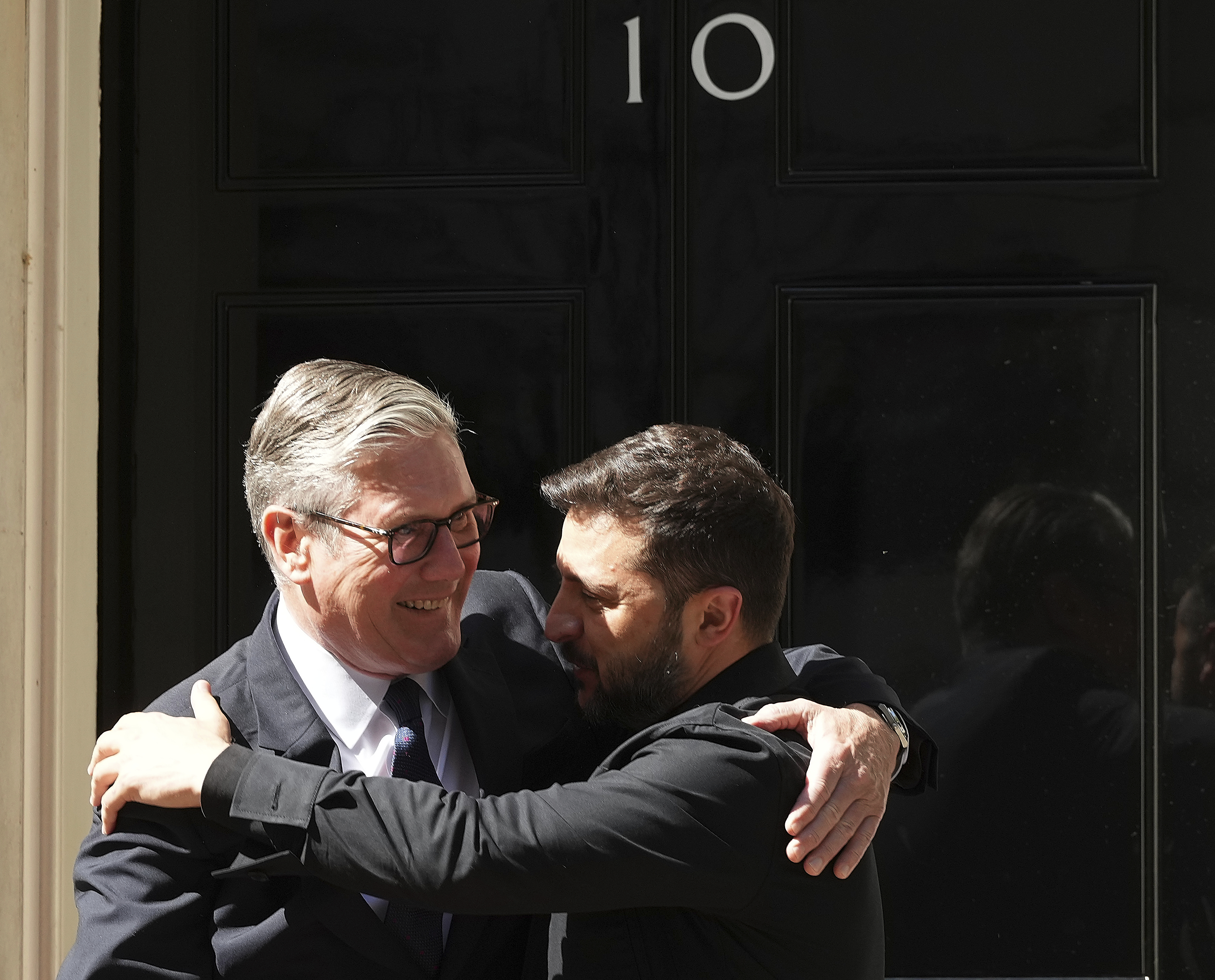 Britain's Prime Minister Keir Starmer welcomes Ukraine's President Volodymyr Zelenskyy to Downing Street in London, Monday, June 23, 2025. (AP Photo/Frank Augstein)