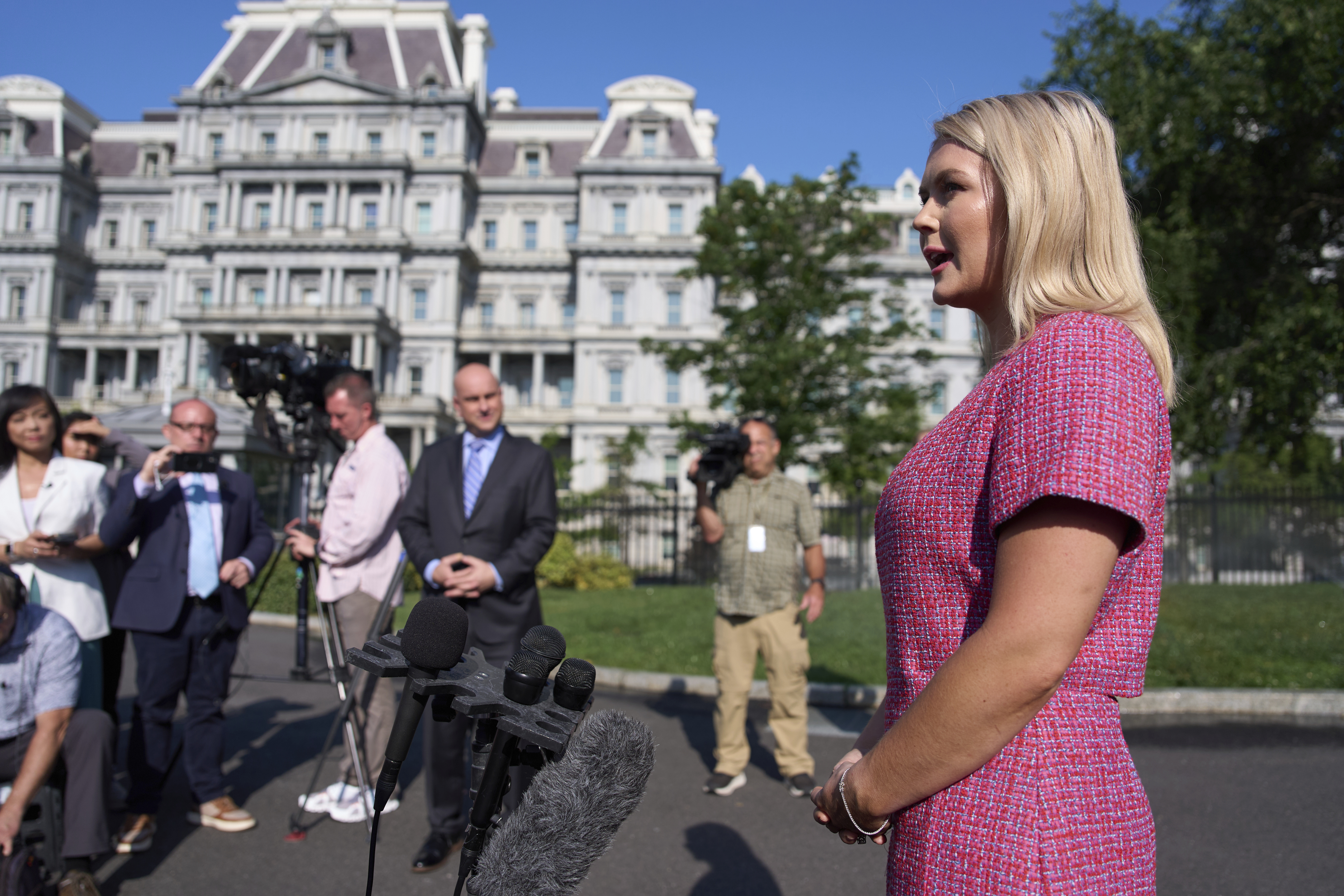 White House press secretary Karoline Leavitt talks with reporters at the White House, Monday, June 23, 2025, in Washington. (AP Photo/Evan Vucci)