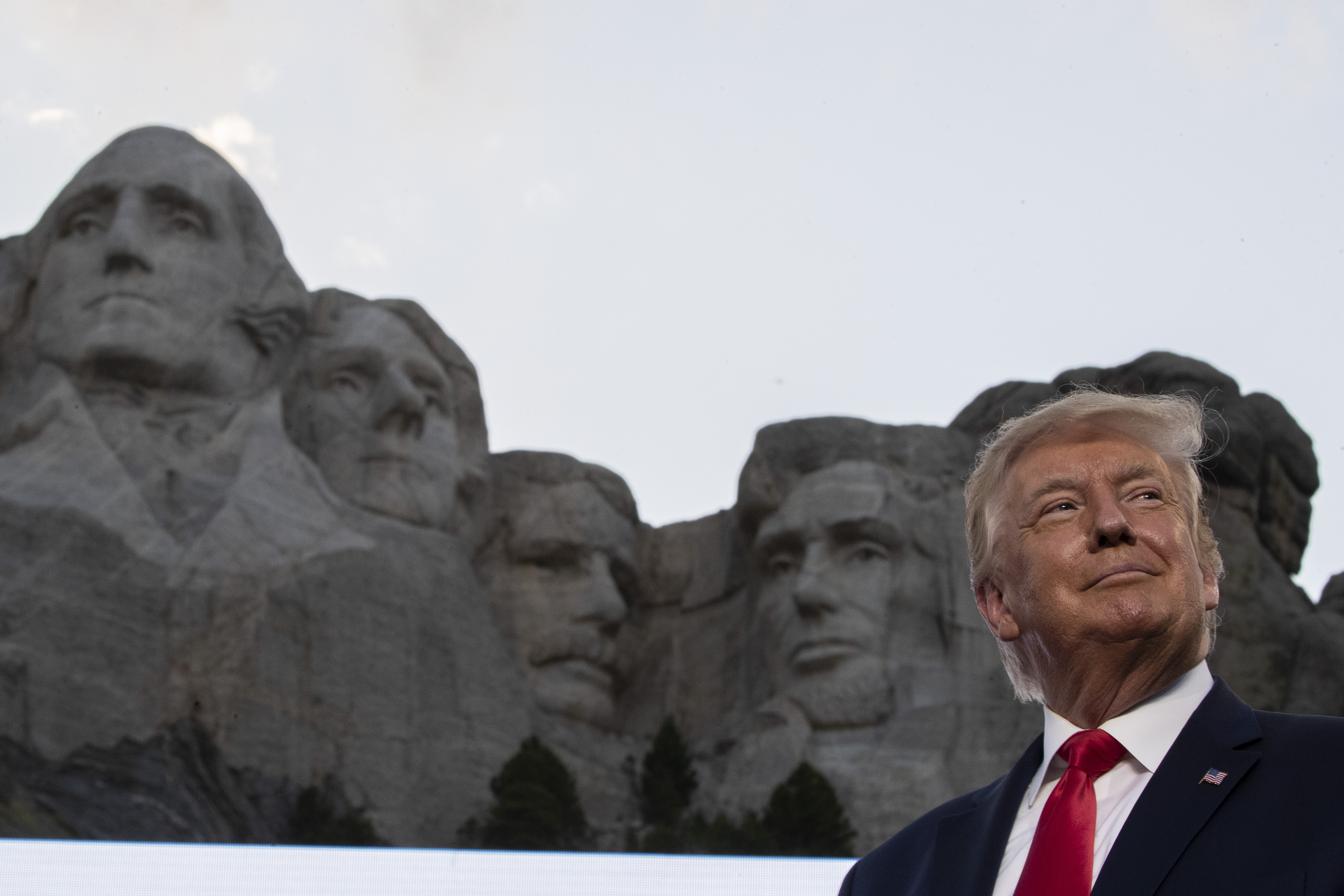 FILE - Then-President Donald Trump stands at Mount Rushmore National Memorial on July 3, 2020, near Keystone, S.D. (AP Photo/Alex Brandon, File)