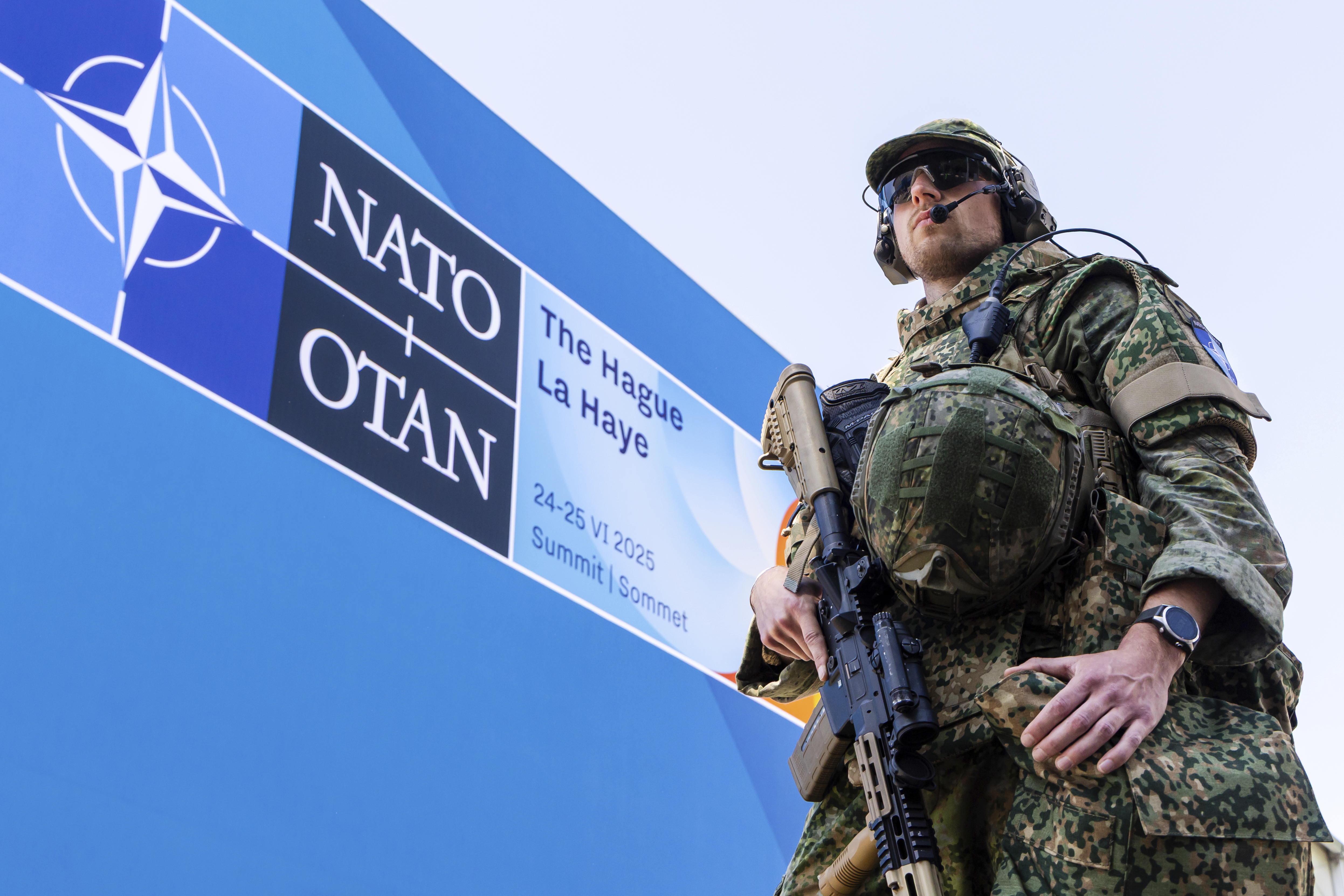 Security patrol around the perimeter of the venue in The Hague, Netherlands, Monday, June 23, 2025 ahead of the upcoming NATO summit. (AP Photo/Geert Vanden Wijngaert)