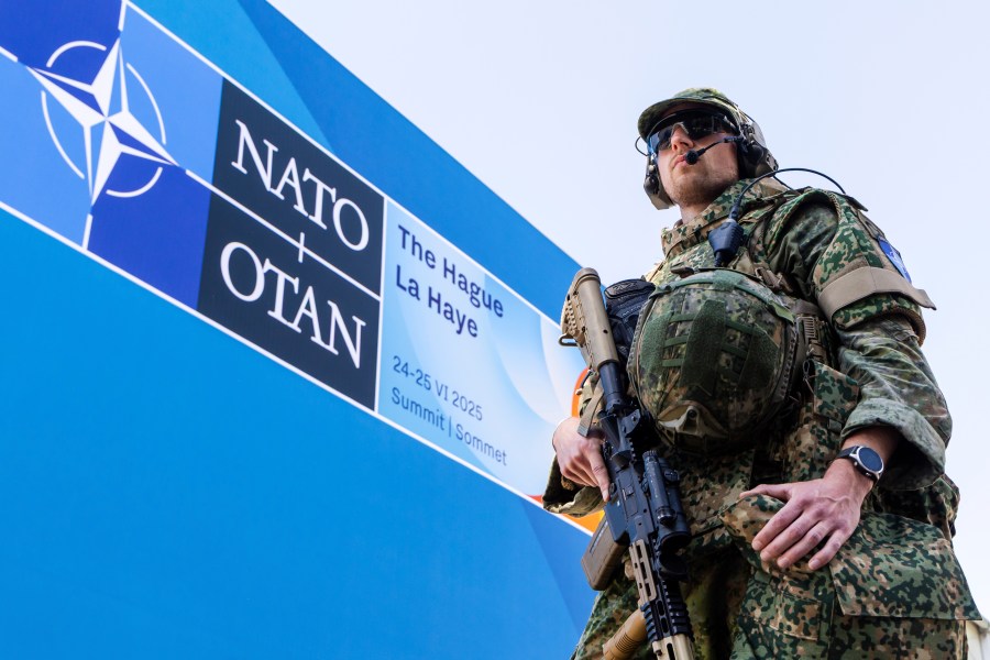 Security patrol around the perimeter of the venue in The Hague, Netherlands, Monday, June 23, 2025 ahead of the upcoming NATO summit. (AP Photo/Geert Vanden Wijngaert)