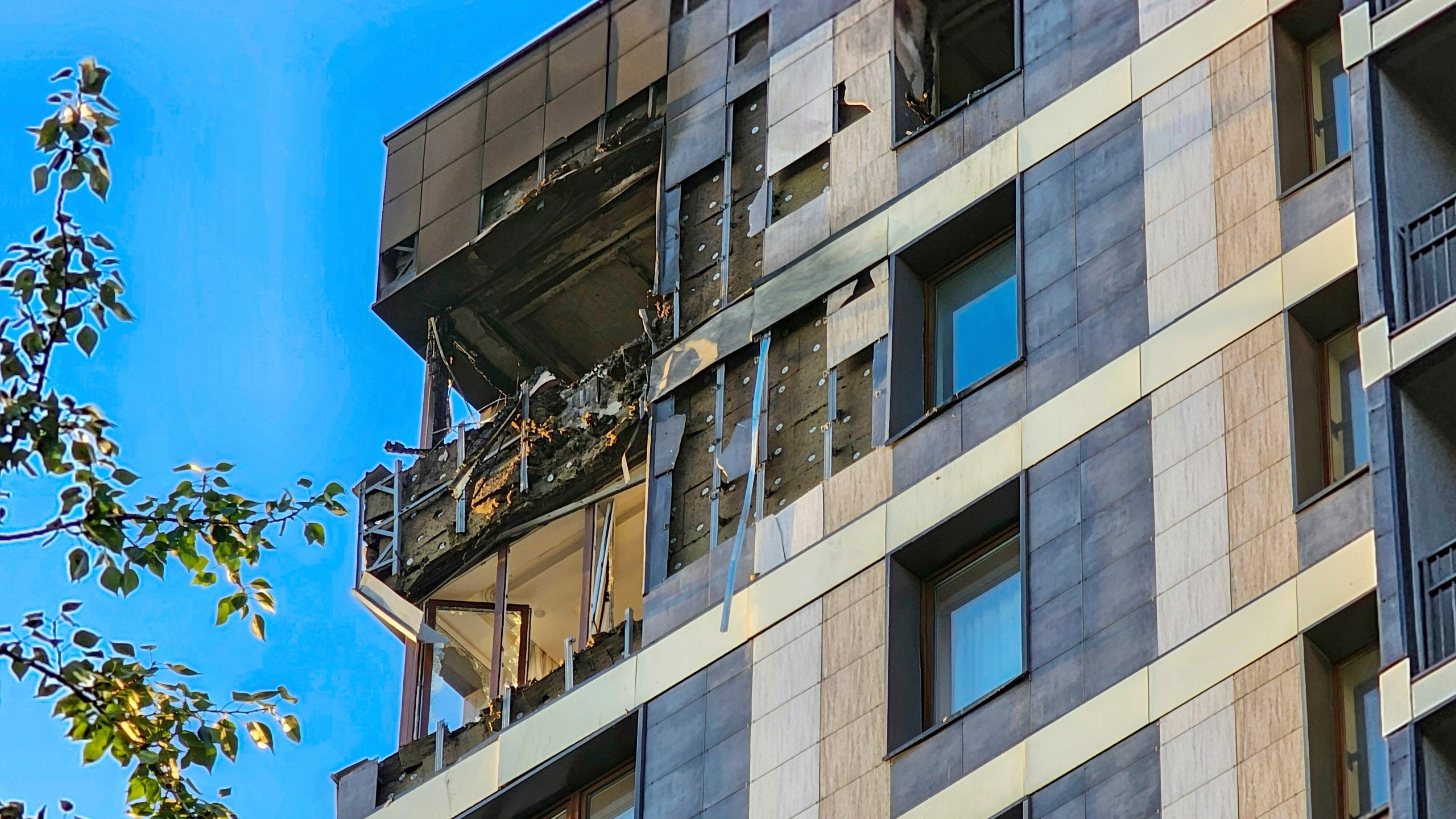 A view of the damaged flat of an apartment building where the Ukrainian drone fell in Krasnogorsk, just outside Moscow, Russia, on Tuesday, June 24, 2025. (Moscow News Agency via AP)