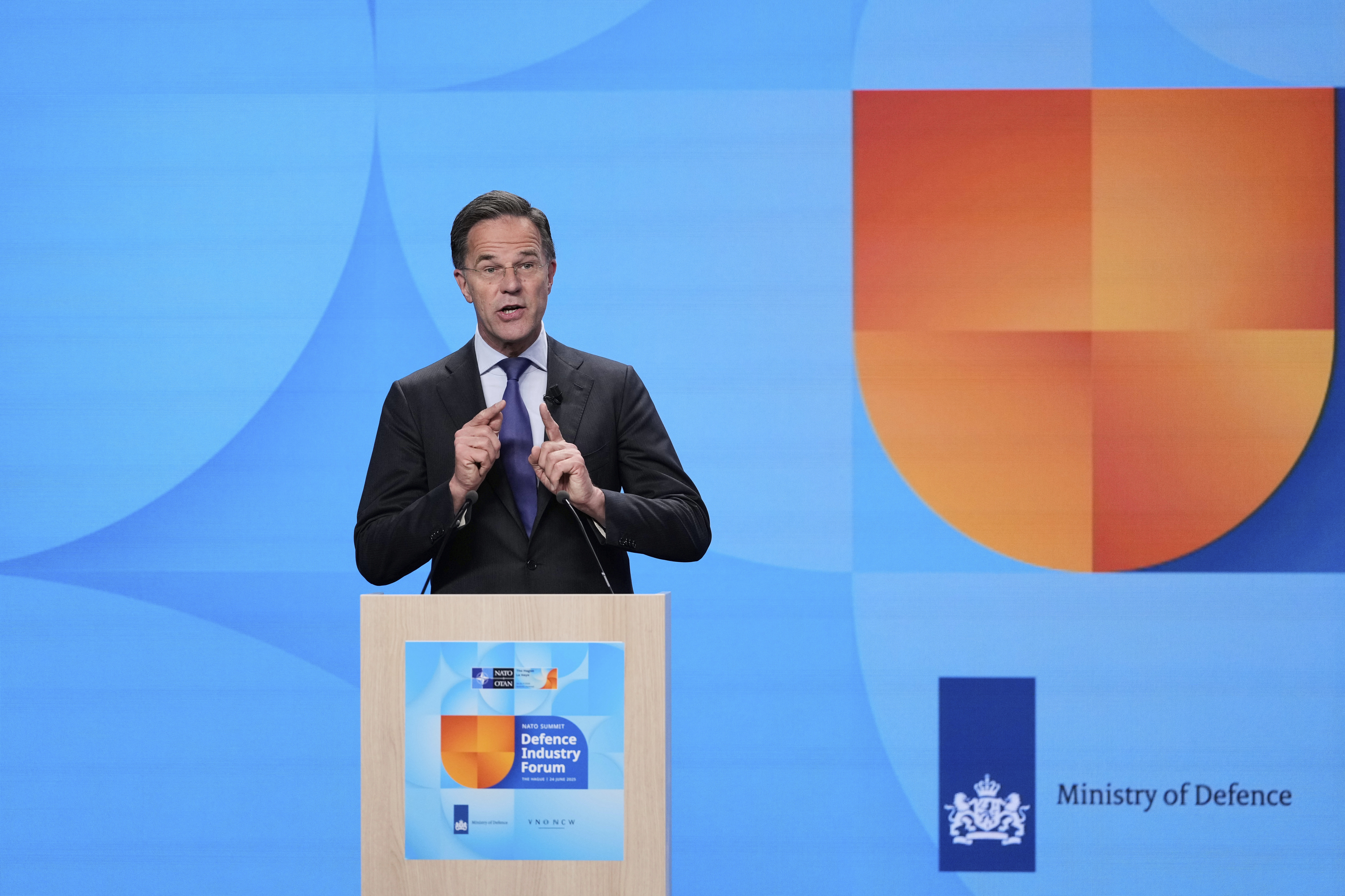 NATO Secretary General Mark Rutte addresses the audience during the NATO defense forum on the sidelines of the NATO summit in The Hague, Netherlands, Tuesday, June 24, 2025. (AP Photo/Matthias Schrader)