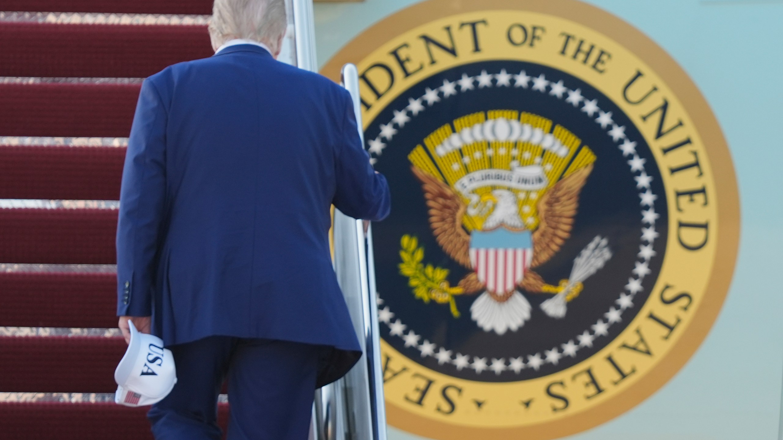 President Donald Trump boards Air Force One, Tuesday, June 24, 2025, at Joint Base Andrews, Md., on his way to The Hague, to join world leaders gathering in the Netherlands for a two-day NATO summit. (AP Photo/Manuel Balce Ceneta)