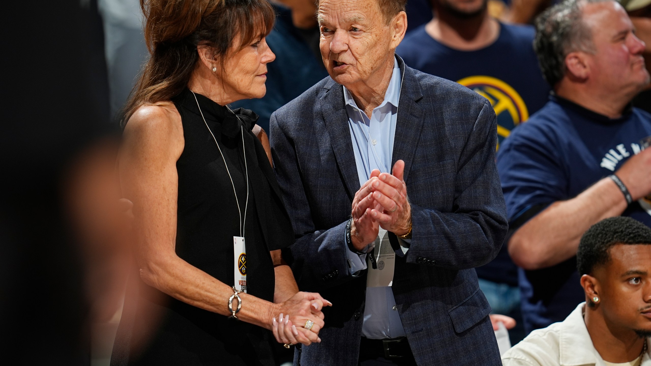 FILE - Minnesota Timberwolves owner Glen Taylor chats with his wife, Becky, in the second half of Game 1 of an NBA basketball second-round playoff series, May 4, 2024, in Denver. (AP Photo/David Zalubowski, File)