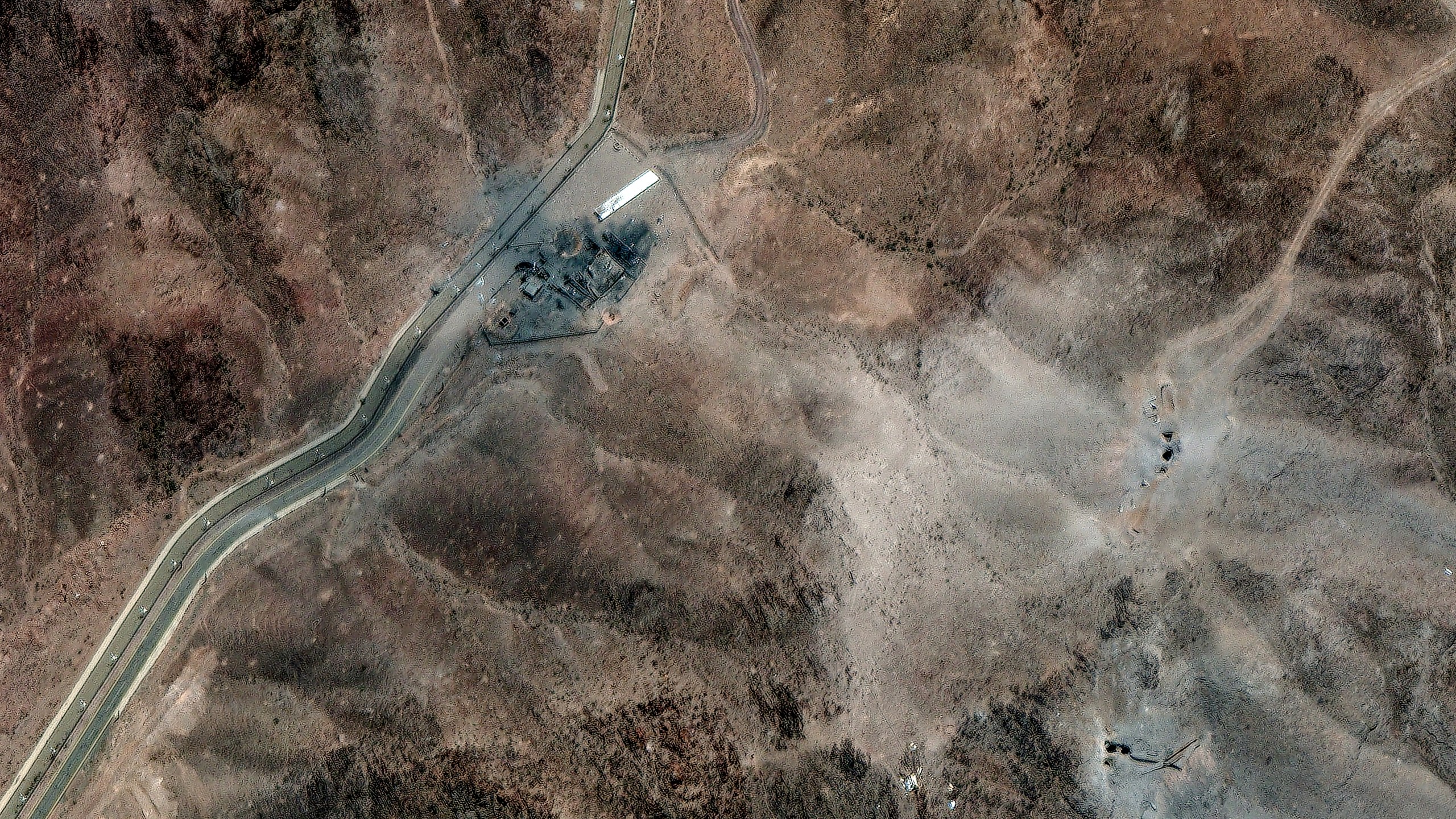 This Tuesday, June 24, 2025, satellite image provided by Maxar Technologies shows damage at Fordo enrichment facility after strikes in Iran on June 23. (Maxar Technologies via AP)