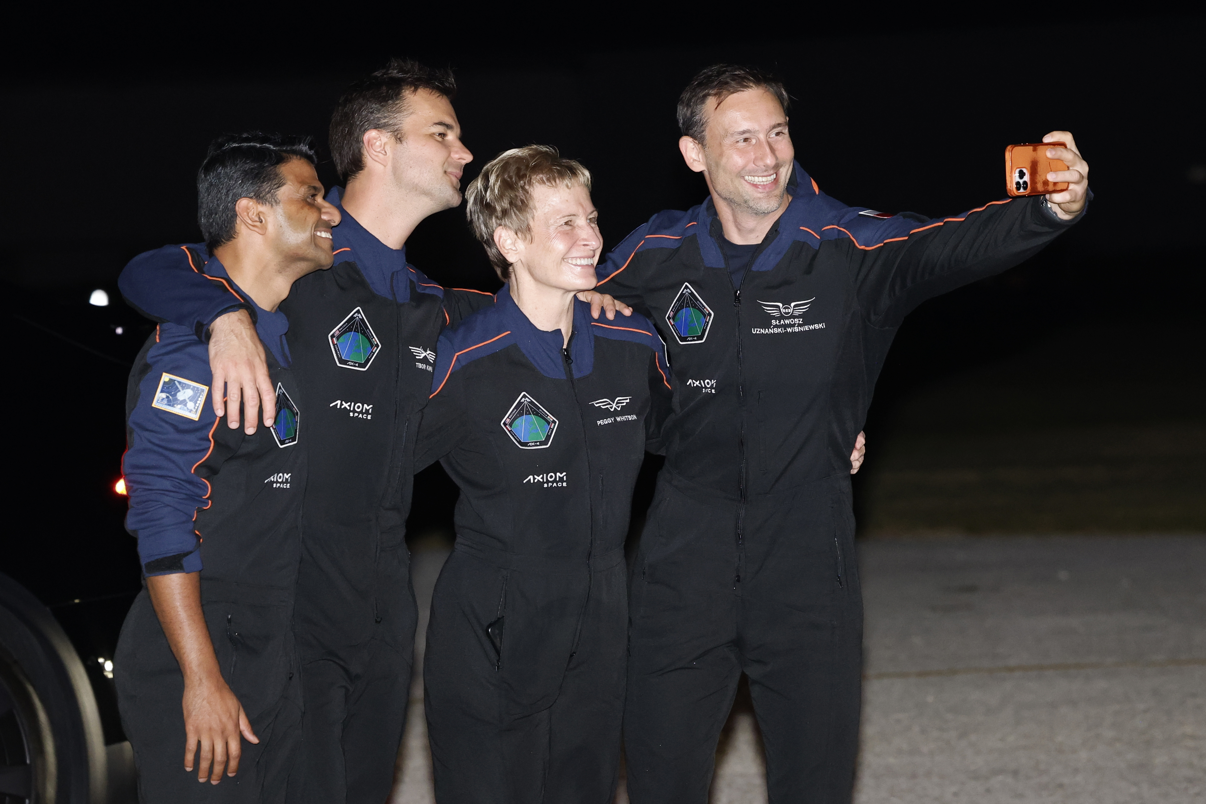 SpaceX Falcon 9 crew, Shubhanshu Shukla of the Indian Space Research Organization, from left, Tibor Kapu of Hungary, commander Peggy Whitson, and Slawosz Uznanski-Wisniewski of Poland, pose for a selfie before departing for a launch to the International Space Station at the Kennedy Space Center in Cape Canaveral, Fla., Tuesday, June 24, 2025. (AP Photo/Terry Renna)