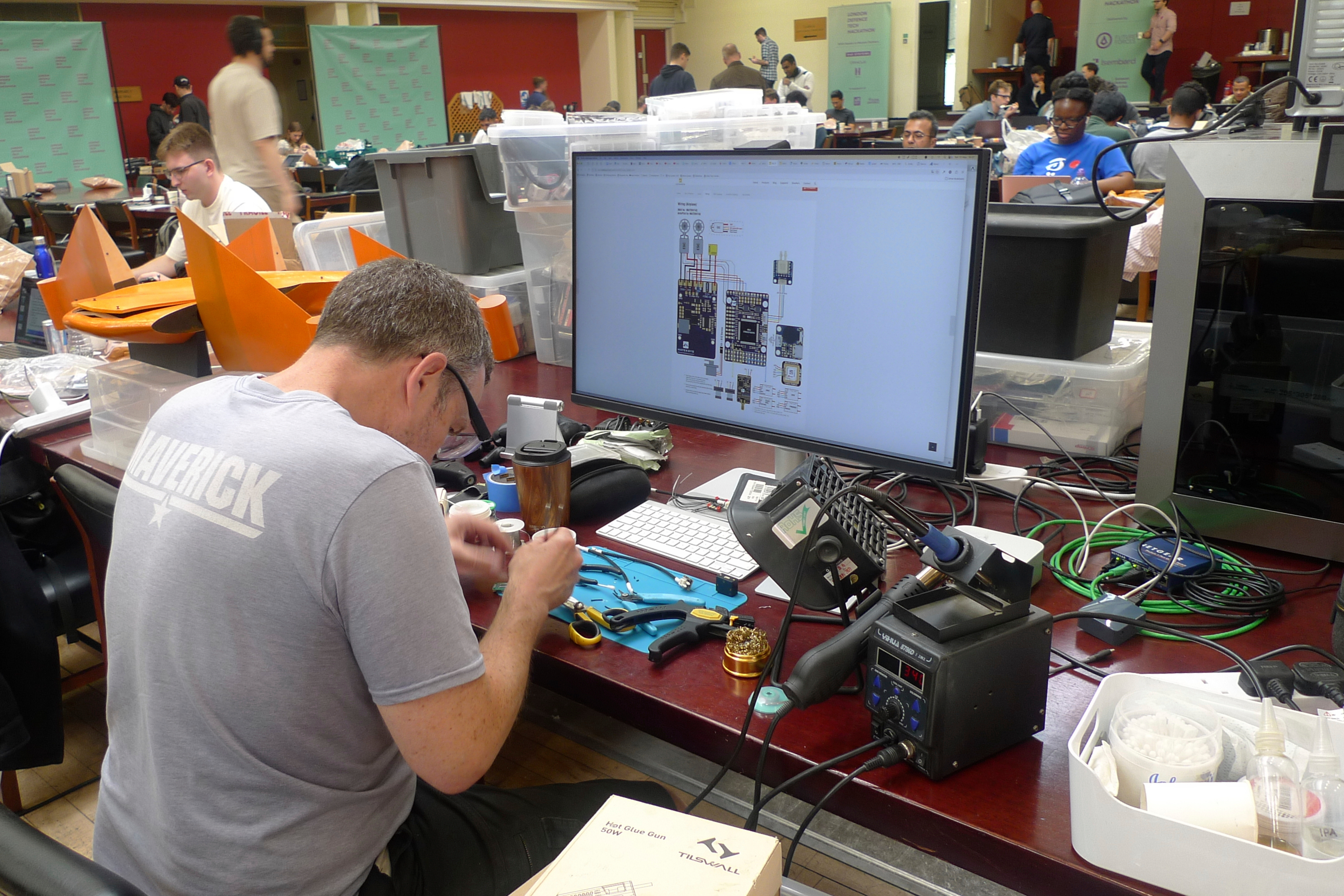 Participants gather for the London Defence Tech Hackathon, a weekend brainstorming solution for technical challenges, at the Royal Military Academy Sandhurst in Camberley, England, May 10, 2025. (AP Photos/Kelvin Chan)