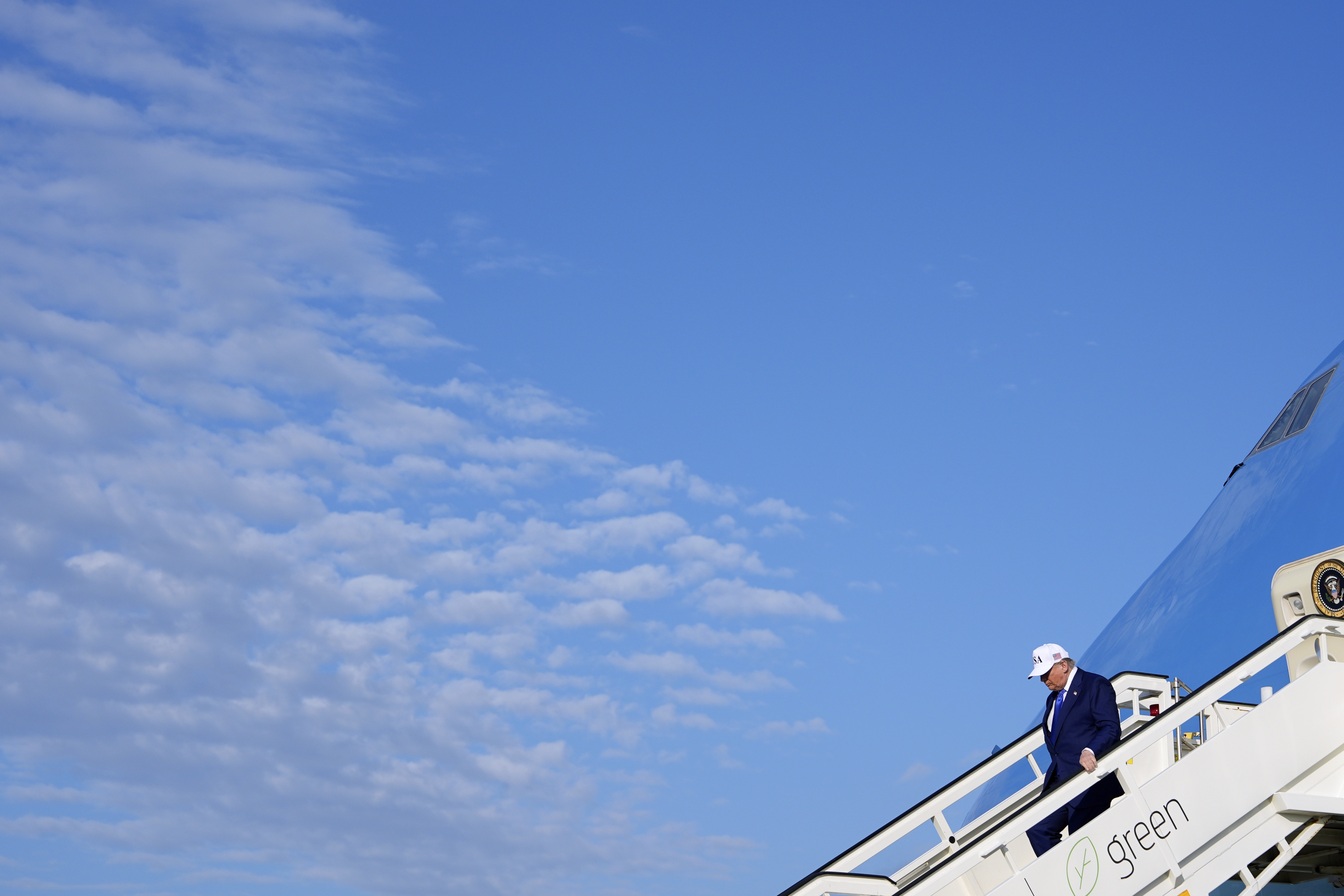 President Donald Trump exits Air Force One as he arrives at Amsterdam Schiphol Airport ahead of the NATO summit, taking place in The Hague, Netherlands, Tuesday, June 24, 2025. (AP Photo/Alex Brandon)