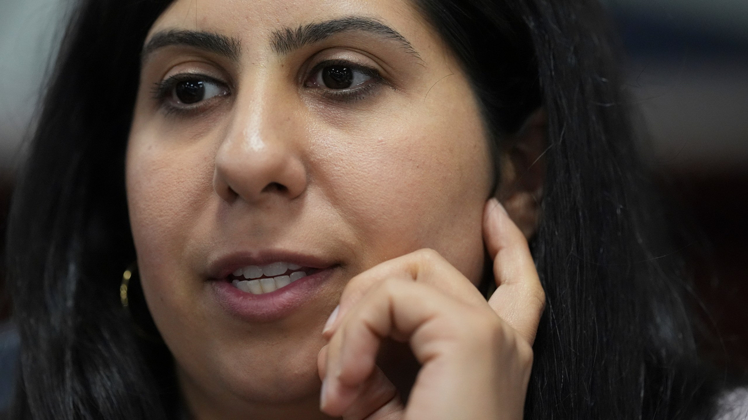 FILE - Florida Rep. Anna Eskamani talks with a colleague at the end of a meeting of the House Economic Infrastructure Subcommittee during a legislative session at the state Capitol in Tallahassee, Fla., March 5, 2025. (AP Photo/Rebecca Blackwell, File)