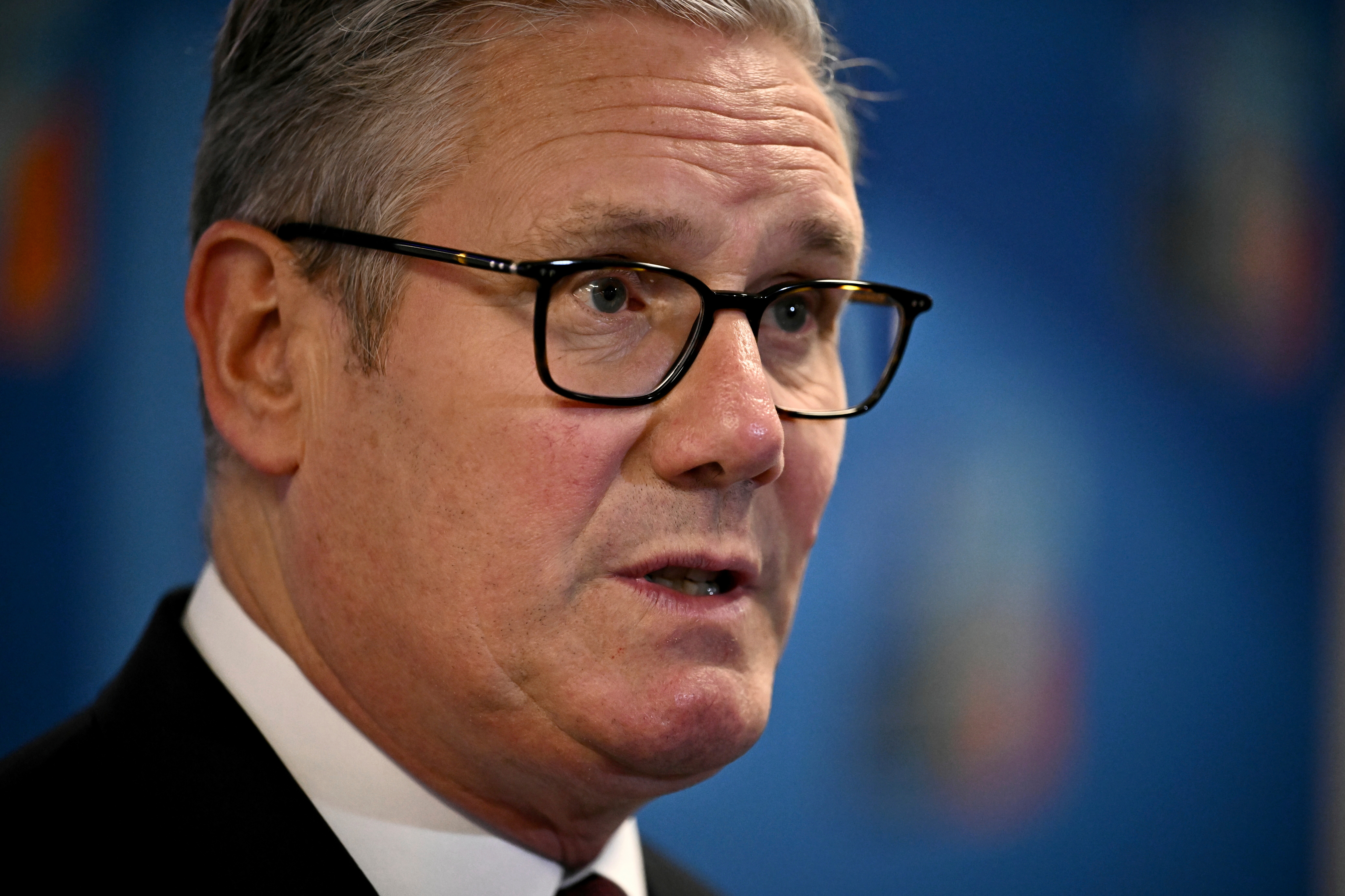 Britain's Prime Minister Keir Starmer speaks to the media as he arrives for the NATO summit of heads of state and government in The Hague Wednesday, June 25, 2025. (Ben Stansall/Pool Photo via AP)