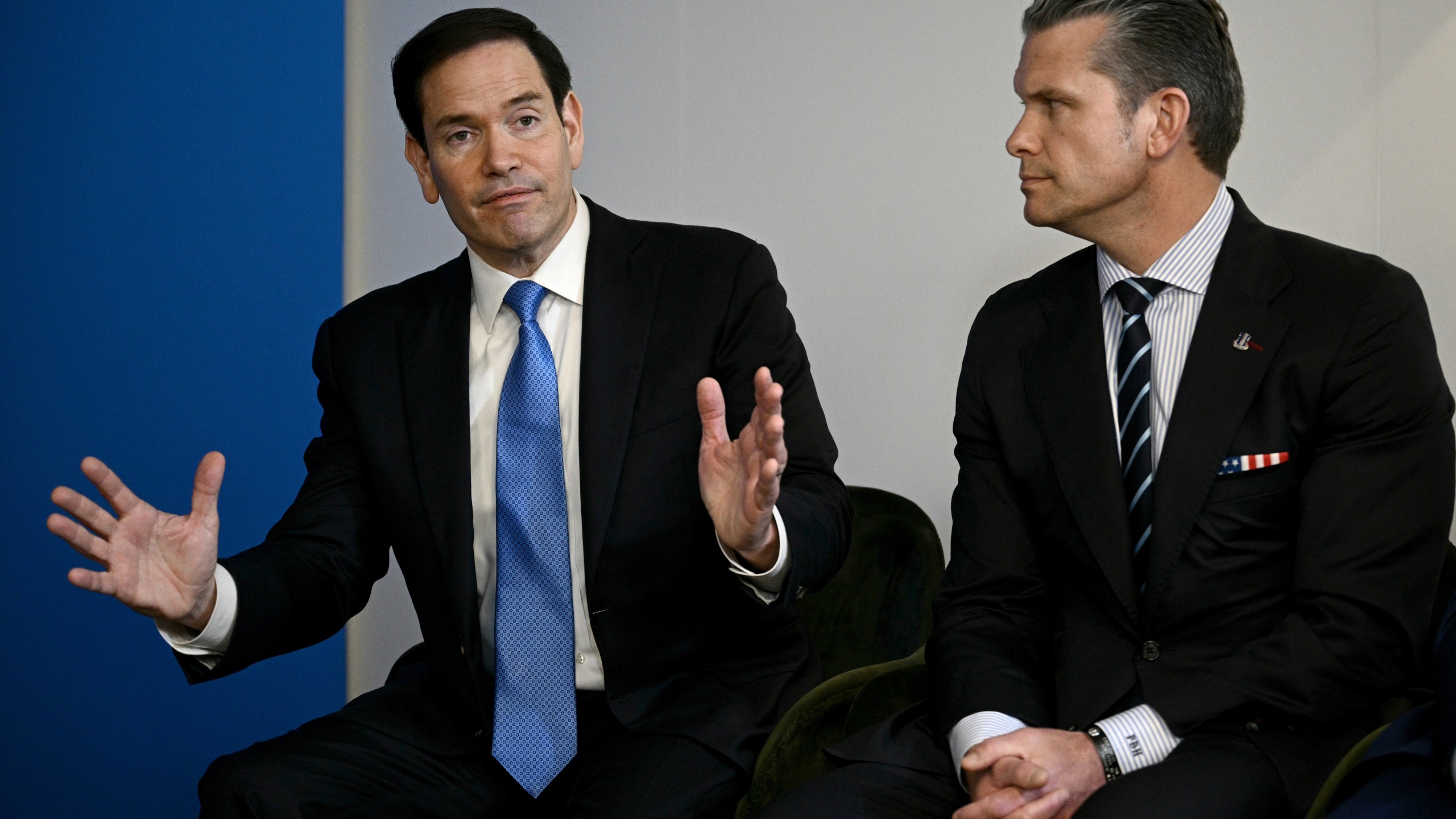 U.S. Secretary of State Marco Rubio, left, speaks next to U.S. Defense Secretary Pete Hegseth during a meeting between U.S. President Donald Trump with NATO Secretary General Mark Rutte at the NATO summit of heads of state and government in The Hague, Netherlands, Wednesday, June 25, 2025.(Brendan Smialowski/Pool Photo via AP)