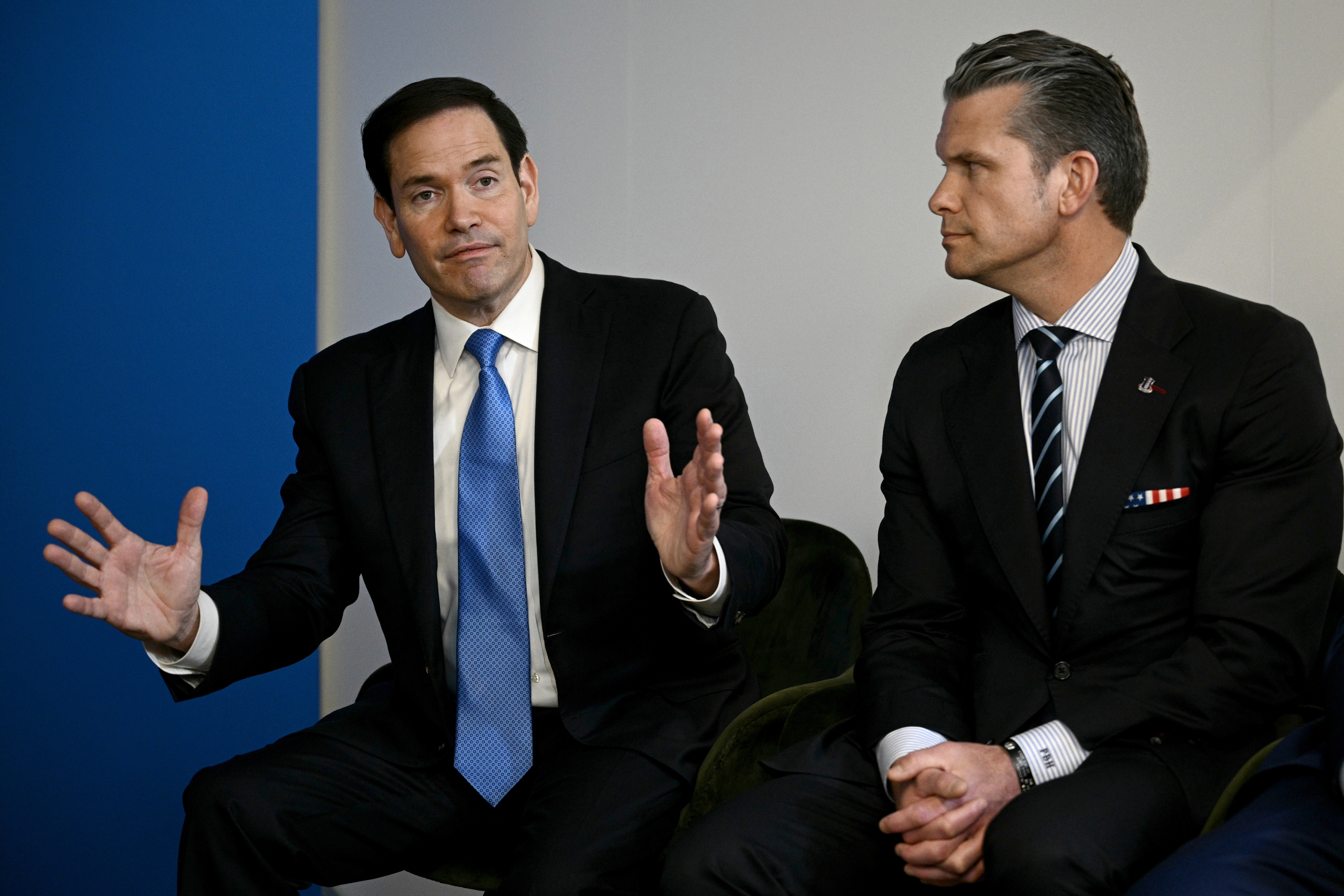 U.S. Secretary of State Marco Rubio, left, speaks next to U.S. Defense Secretary Pete Hegseth during a meeting between U.S. President Donald Trump with NATO Secretary General Mark Rutte at the NATO summit of heads of state and government in The Hague, Netherlands, Wednesday, June 25, 2025.(Brendan Smialowski/Pool Photo via AP)