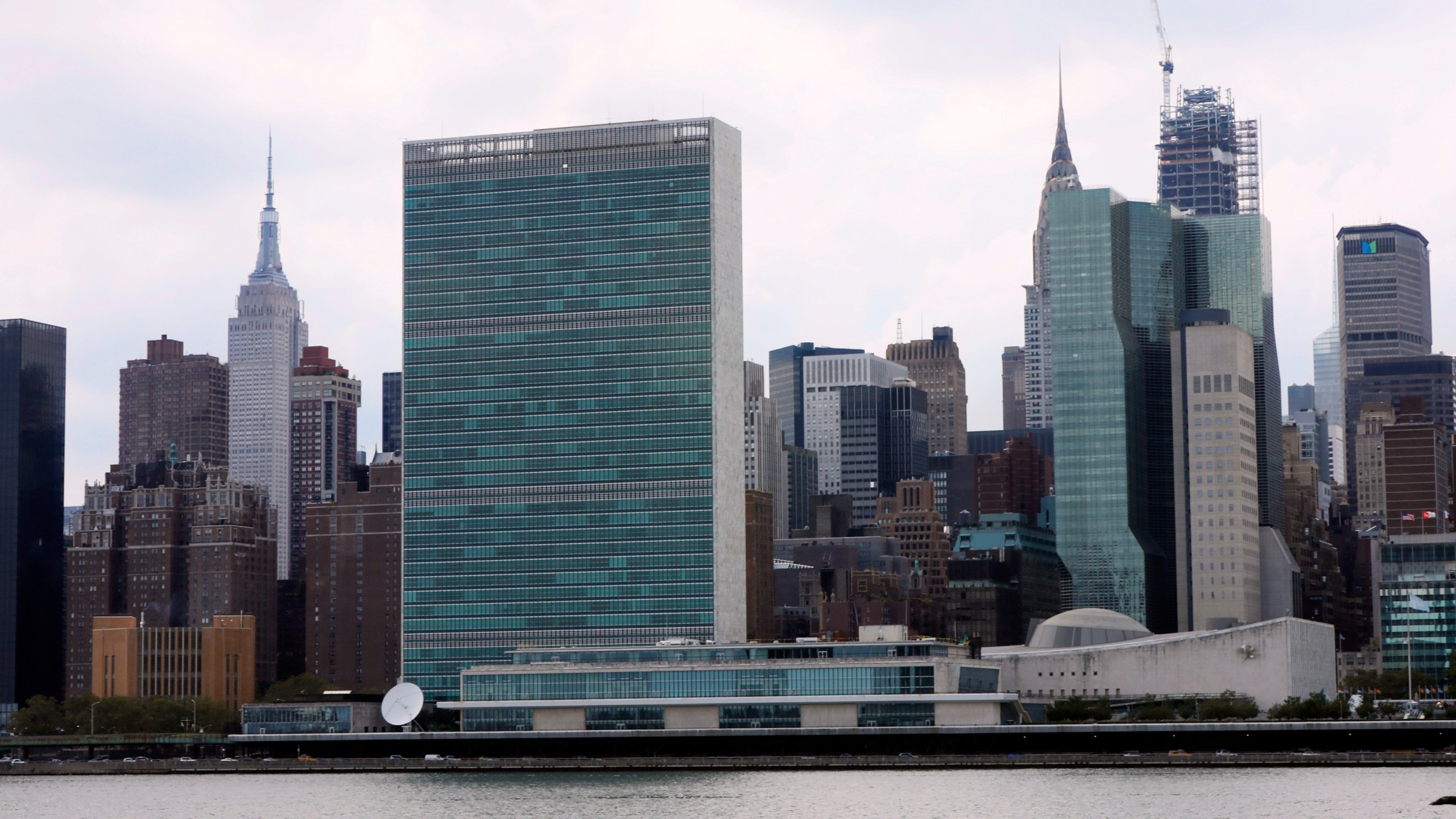 The United Nations complex and Empire State Building, left, as seen from the Long Island City neighborhood of the Queens borough of New York, Aug. 22, 2019. (AP Photo/Richard Drew, File)