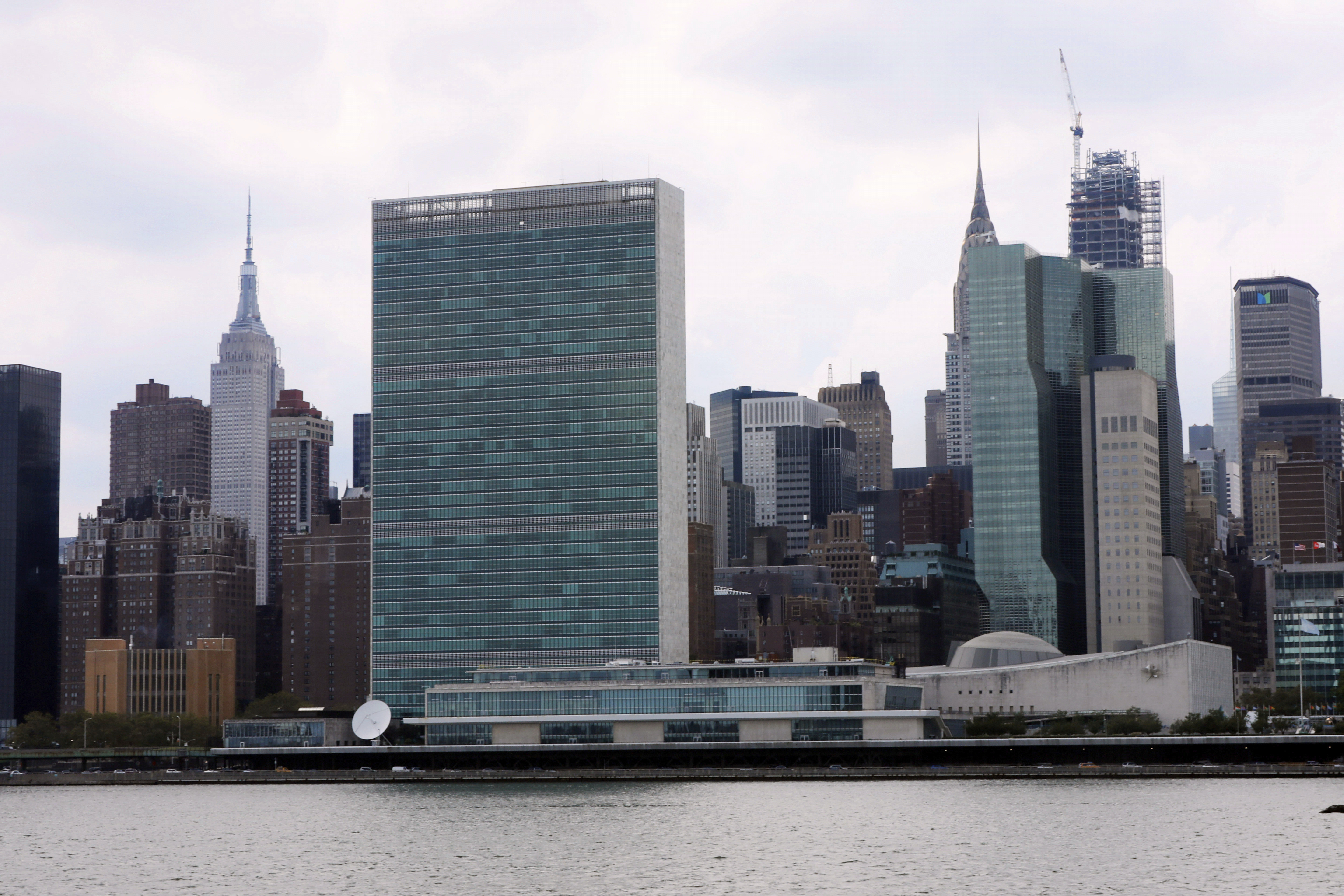 The United Nations complex and Empire State Building, left, as seen from the Long Island City neighborhood of the Queens borough of New York, Aug. 22, 2019. (AP Photo/Richard Drew, File)