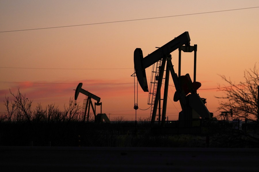 FILE - Pumpjacks are seen before sunrise in Hobbs, N.M., Feb. 24, 2025. (AP Photo/Julio Cortez, File)