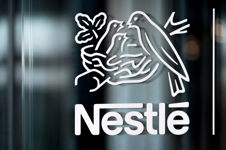 FILE - Nestle's logo is displayed on a window in Vevey, Switzerland, Feb. 14, 2019. (Laurent Gillieron/Keystone via AP, File)