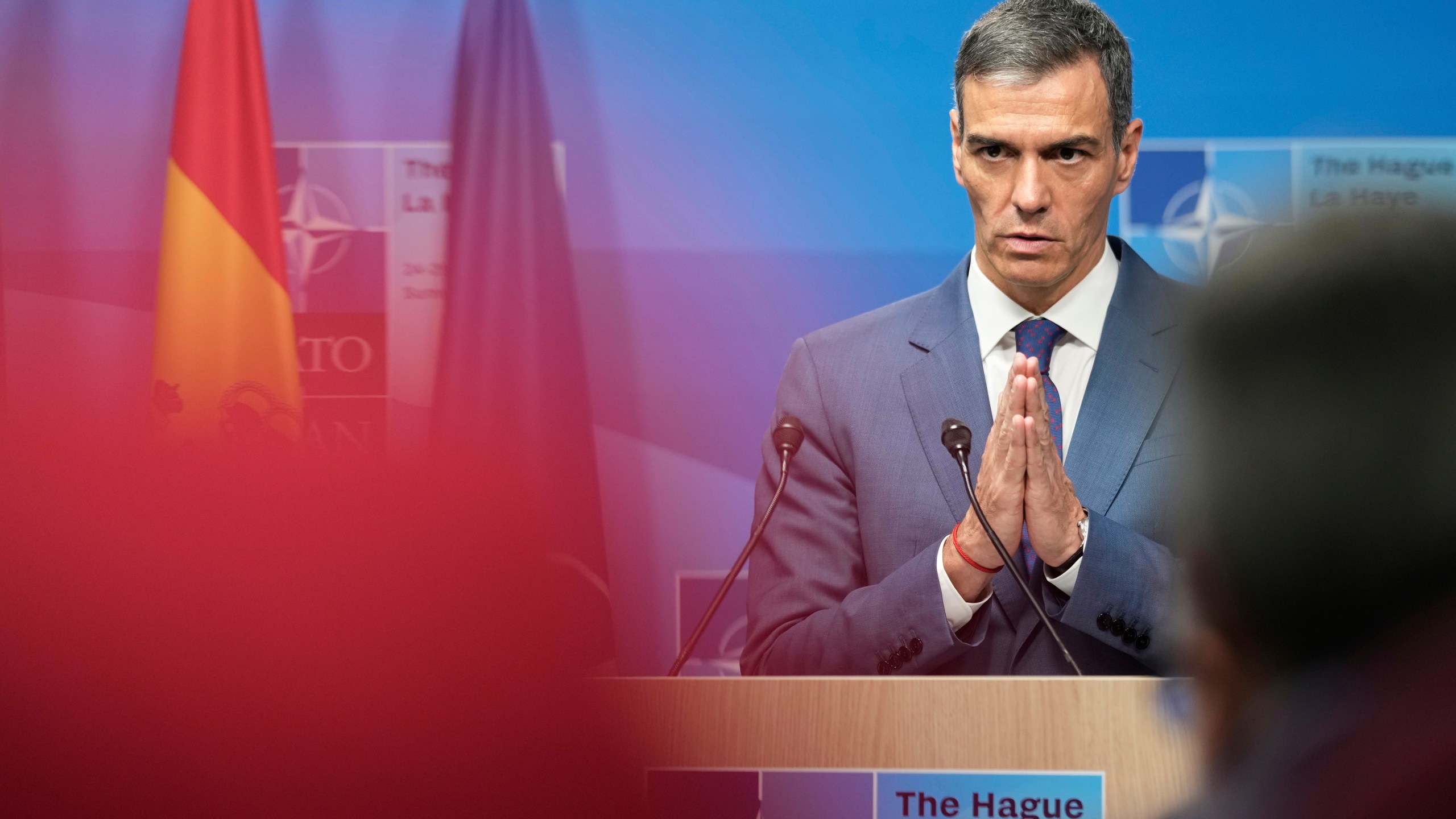 Spain's Prime Minister Pedro Sanchez gestures during a press conference after the plenary session at the NATO summit in The Hague, Netherlands, Wednesday, June 25, 2025. (AP Photo/Markus Schreiber)