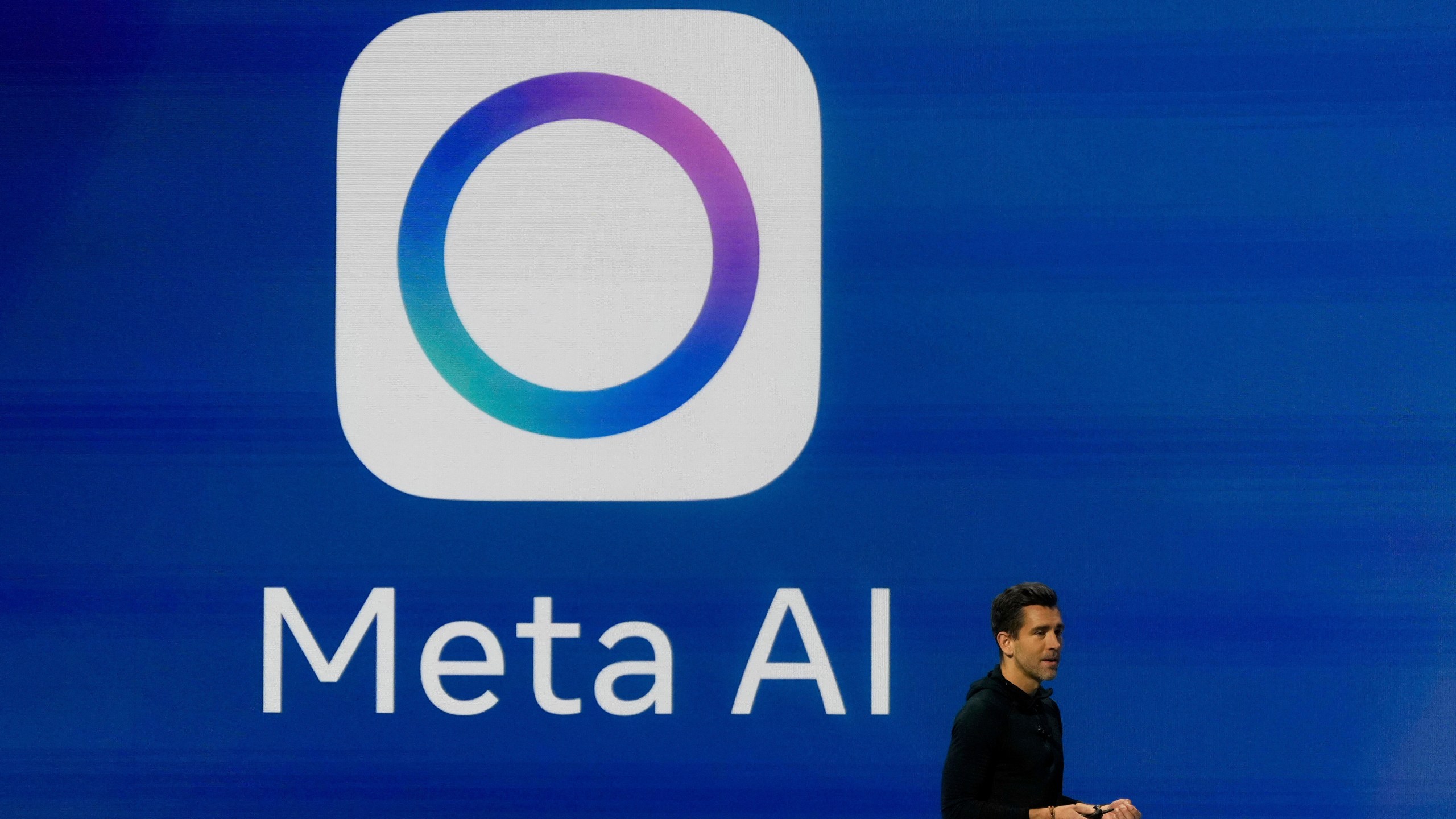 FILE - Meta Chief Product Officer Chris Cox speaks at LlamaCon 2025, an AI developer conference, in Menlo Park, Calif., April 29, 2025. (AP Photo/Jeff Chiu, File)