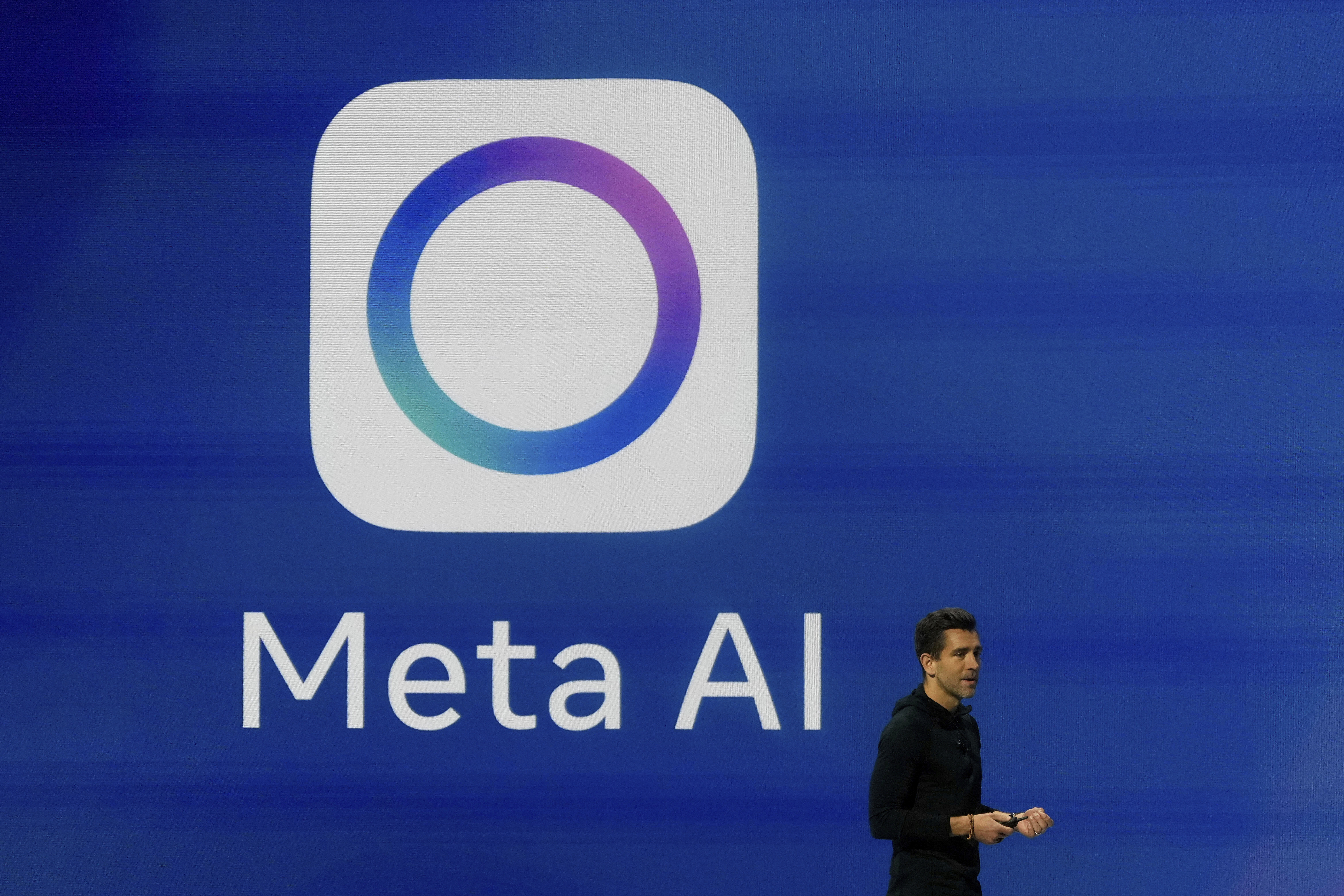FILE - Meta Chief Product Officer Chris Cox speaks at LlamaCon 2025, an AI developer conference, in Menlo Park, Calif., April 29, 2025. (AP Photo/Jeff Chiu, File)