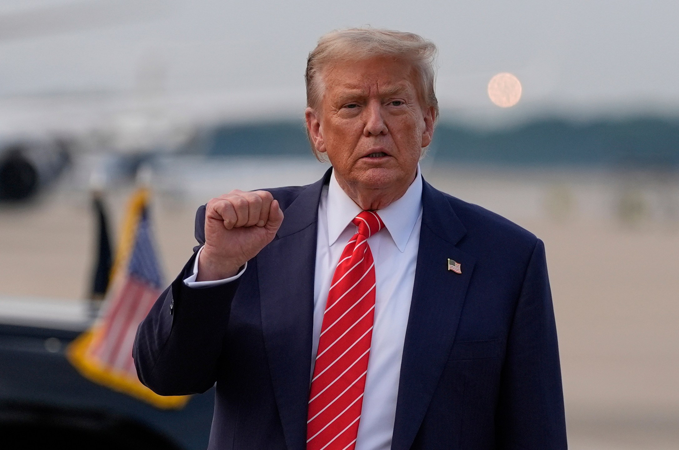 President Donald Trump gestures after arriving on Air Force One, Wednesday, June 25, 2025, at Joint Base Andrews, Md. (AP Photo/Alex Brandon)