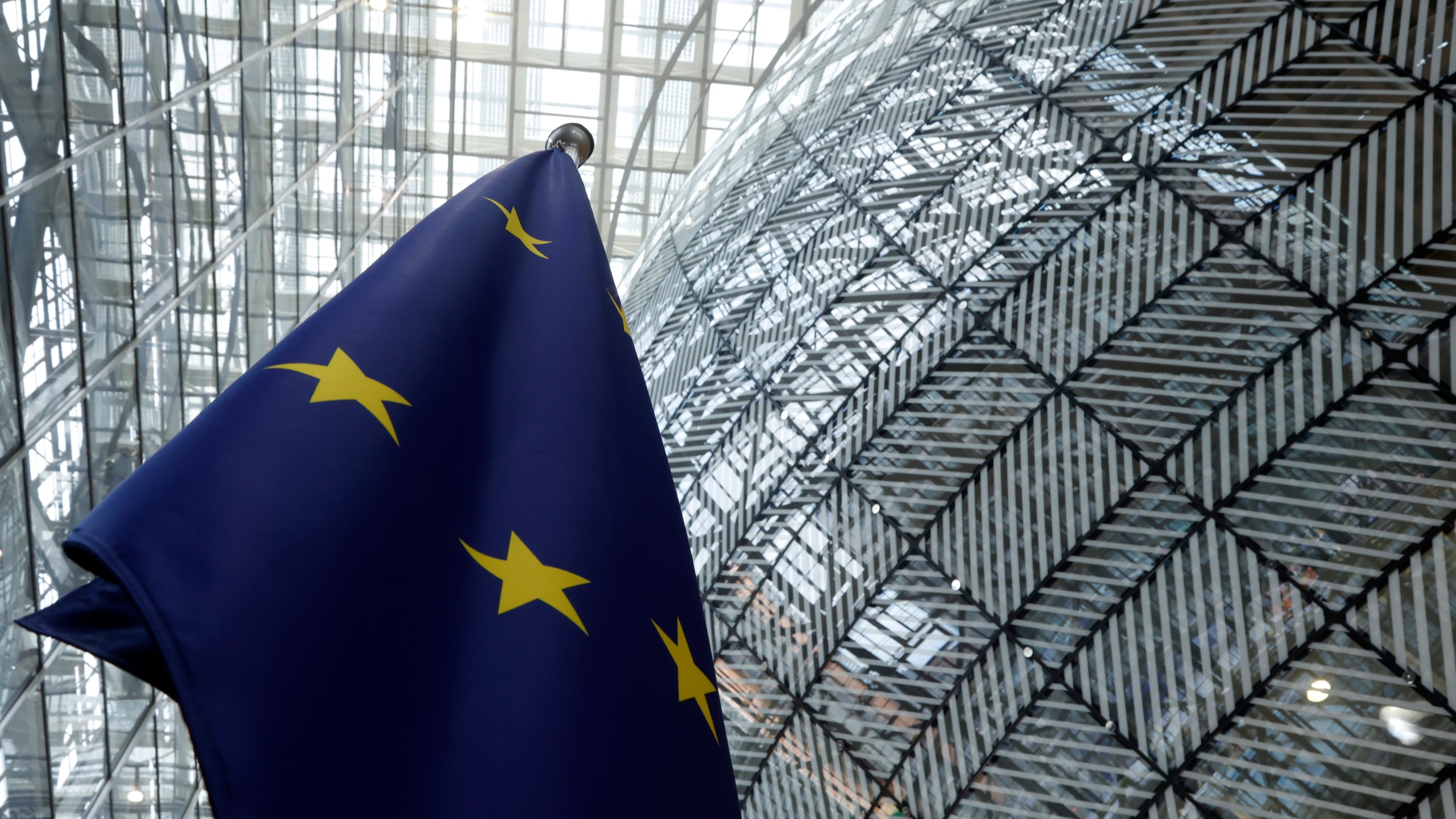 FILE - The European Union flag stands inside the atrium at the European Council building in Brussels, June 17, 2024. (AP Photo/Omar Havana, file)