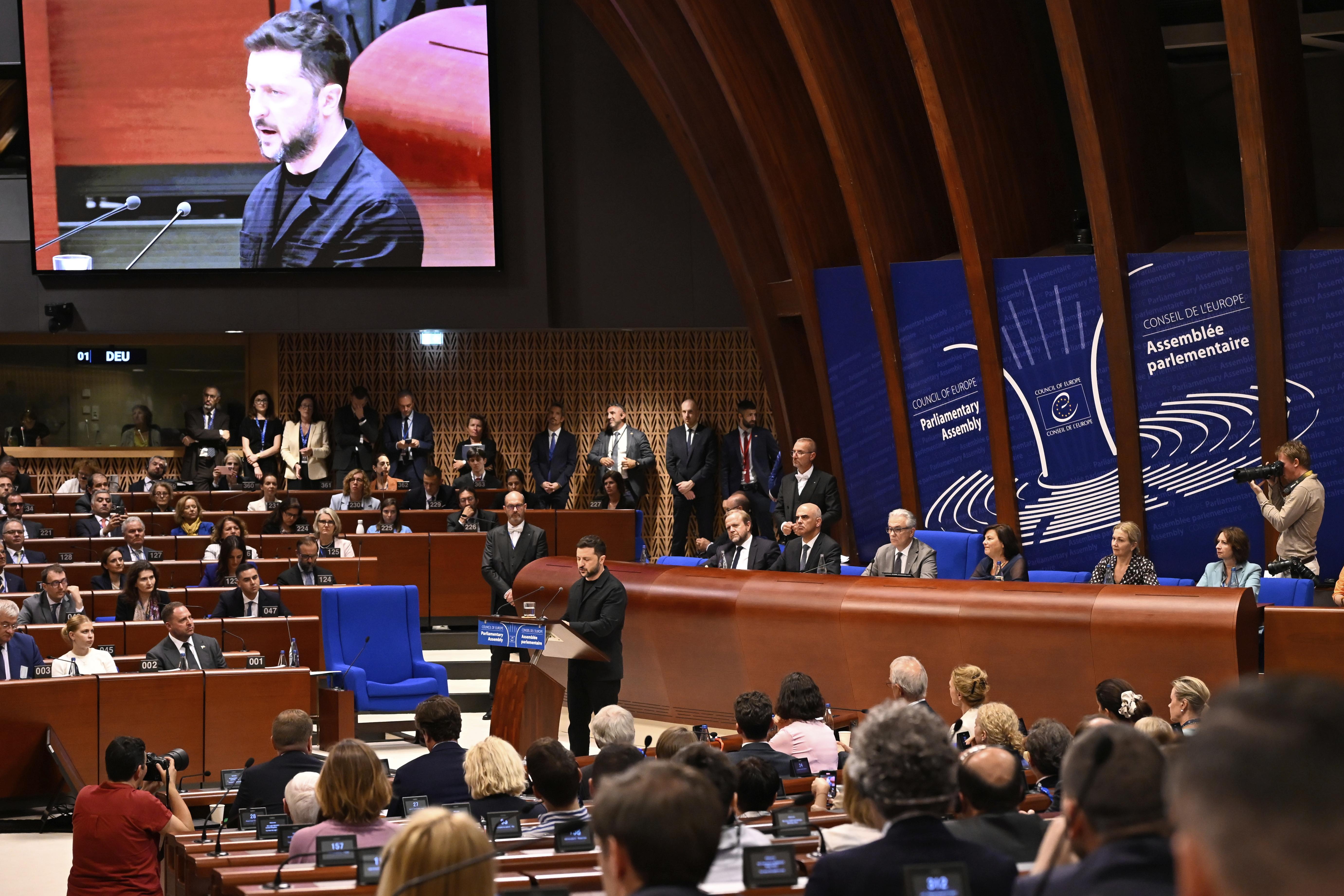 Ukraine's President Volodymyr Zelenskyy, delivers a speech at the Council of Europe after signing the legal instruments necessary to launch the Special Tribunal for the Crime of Aggression against Ukraine, in Strasbourg, eastern France, Wednesday, June 25, 2025. (AP Photo/Pascal Bastien)
