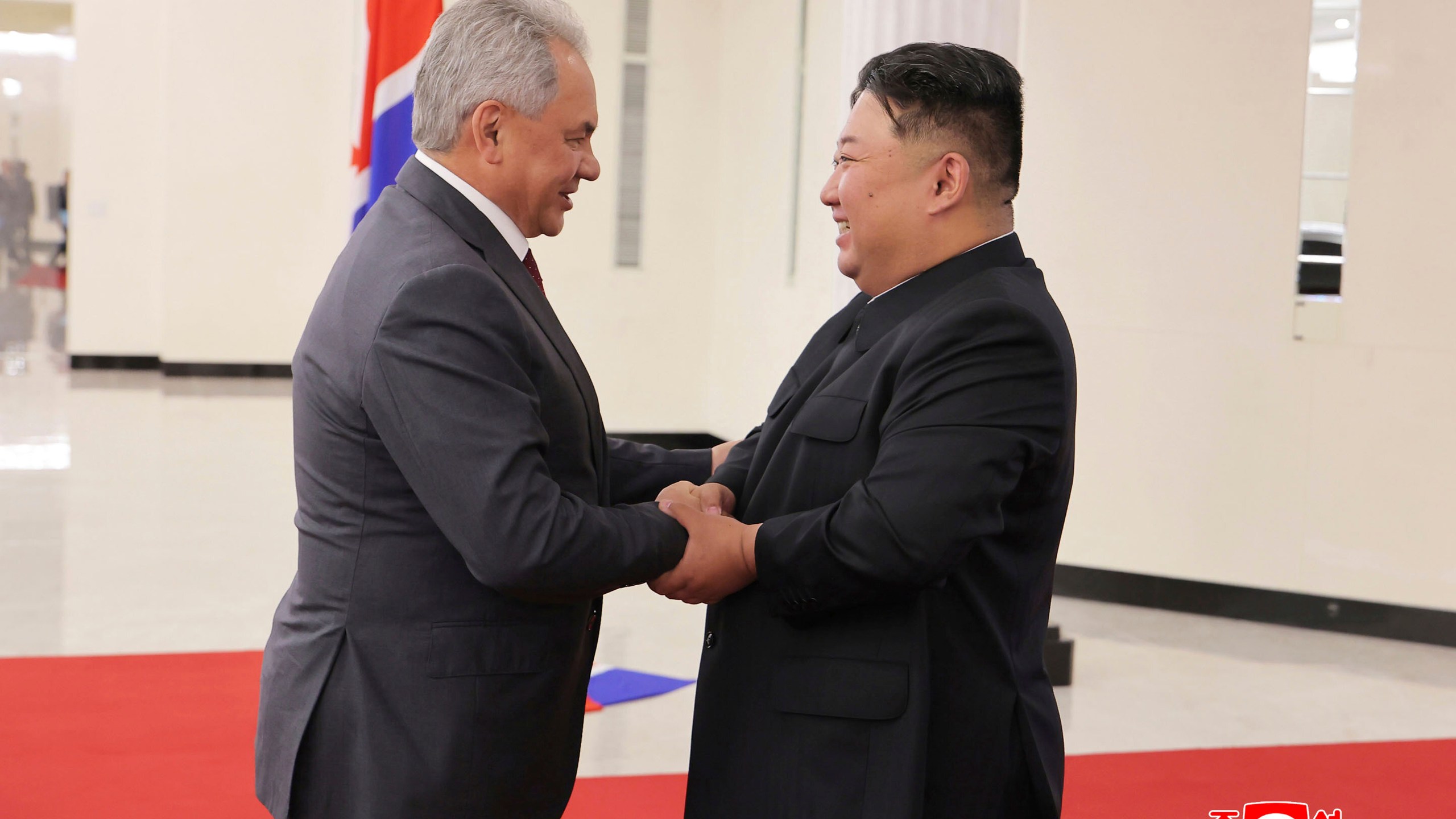 In this photo provided by the North Korean government, North Korean leader Kim Jong Un, right, shakes hands with Russian Security Council Secretary Sergei Shoigu, left, at the headquarters of the ruling Workers' Party in Pyongyang, North Korea, Tuesday, June 17, 2025. Independent journalists were not given access to cover the event depicted in this image distributed by the North Korean government. The content of this image is as provided and cannot be independently verified. Korean language watermark on image as provided by source reads: "KCNA" which is the abbreviation for Korean Central News Agency. (Korean Central News Agency/Korea News Service via AP)